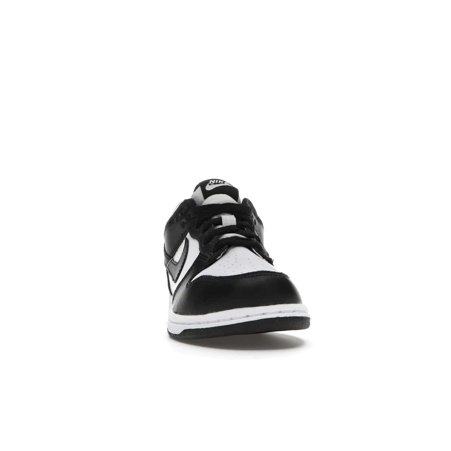 Nike Dunk Low Retro White Black Panda (2021) (PS) - Image 9 - Only at www.BallersClubKickz.com - Retro basketball style with modern updates: Nike Dunk Low PS White/Black. Find the classic sneaker with all-white leather upper, black overlays, black Swoosh branding an more. Originally released in March 2021.