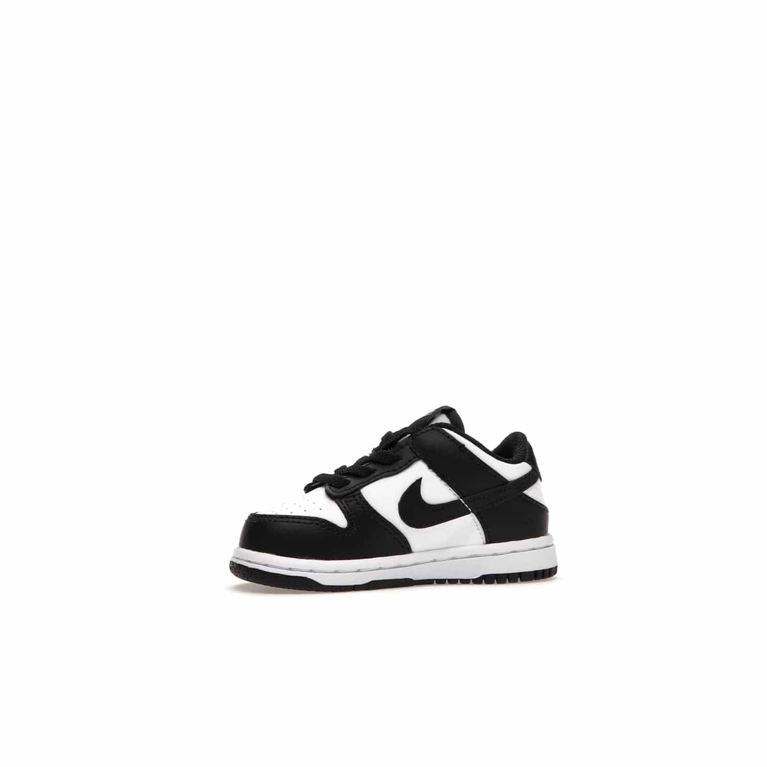 Nike Dunk Low Retro White Black Panda (2021) (TD) - Image 17 - Only at www.BallersClubKickz.com - The perfect blend of classic style and modern style, the Nike Dunk Low Retro White Black (TD) toddler shoe has a soft leather upper, white midsole, and black outsole. Signature Swoosh branding and lightly padded tongue give it timeless Nike style. Released in March 2021.