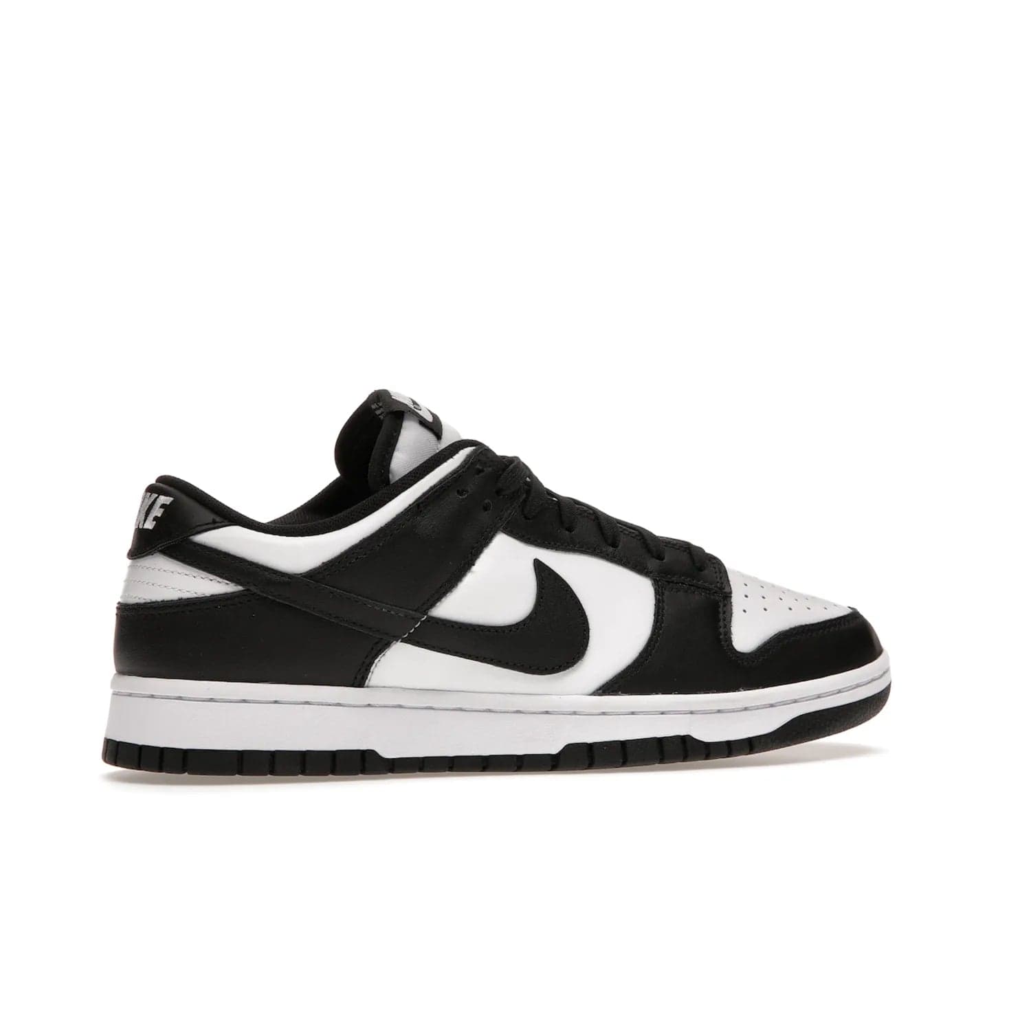 Nike Dunk Low Retro White Black Panda (2021) - Image 35 - Only at www.BallersClubKickz.com - Shop the Nike Dunk Low Retro White Black for classic styling featuring white leather with black leather overlays and classic Nike branding. Released in 2021, this timeless design offers a white midsole and black outsole for a stylish look. Shop all the Nike Dunks & rock this classic look.