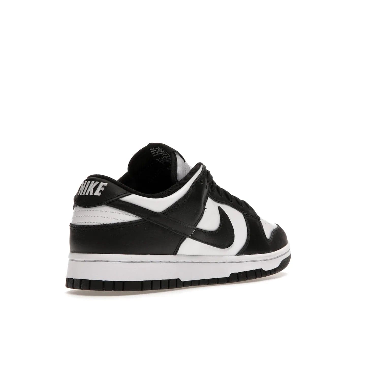 Nike Dunk Low Retro White Black Panda (2021) - Image 32 - Only at www.BallersClubKickz.com - Shop the Nike Dunk Low Retro White Black for classic styling featuring white leather with black leather overlays and classic Nike branding. Released in 2021, this timeless design offers a white midsole and black outsole for a stylish look. Shop all the Nike Dunks & rock this classic look.