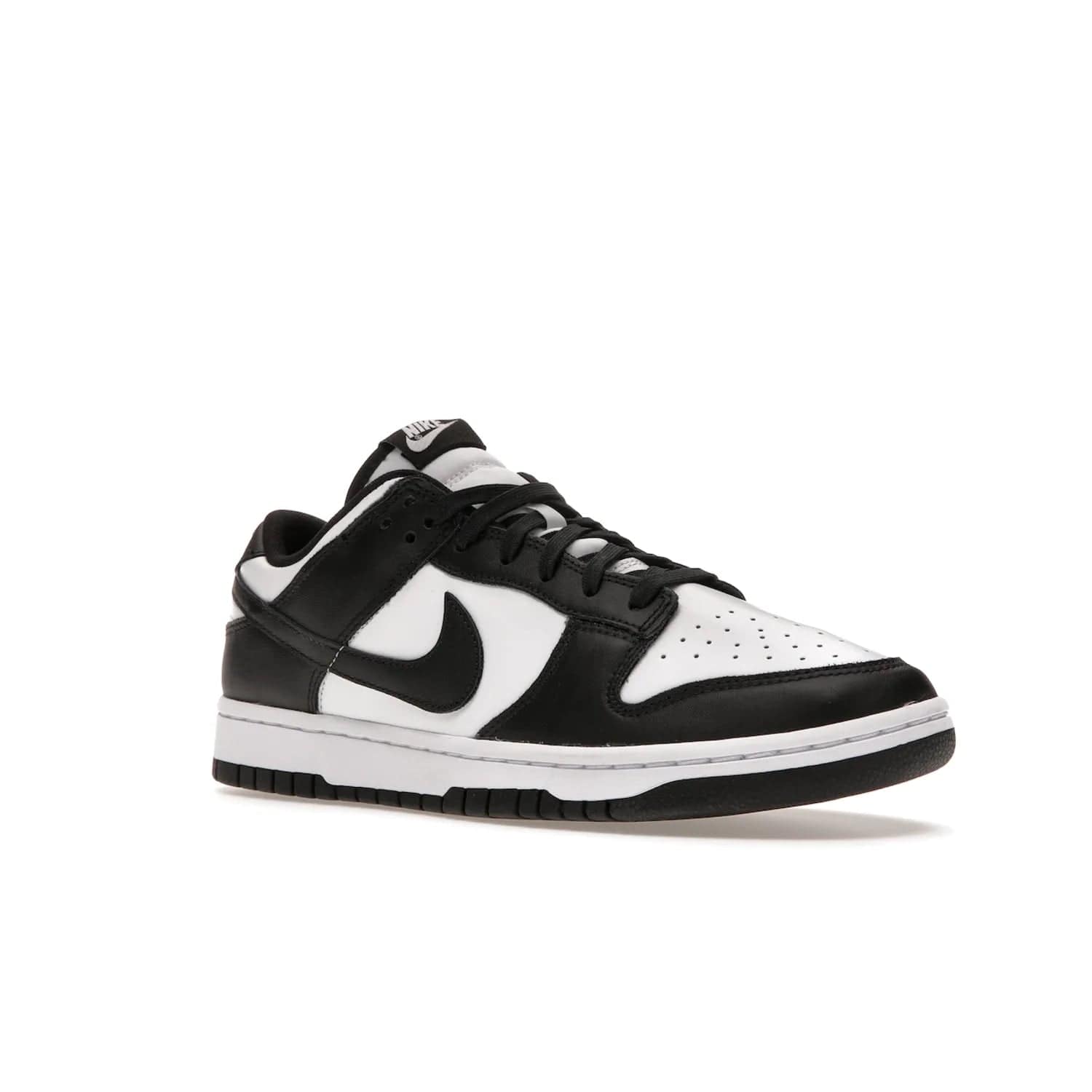 Nike Dunk Low Retro White Black Panda (2021) - Image 5 - Only at www.BallersClubKickz.com - Shop the Nike Dunk Low Retro White Black for classic styling featuring white leather with black leather overlays and classic Nike branding. Released in 2021, this timeless design offers a white midsole and black outsole for a stylish look. Shop all the Nike Dunks & rock this classic look.
