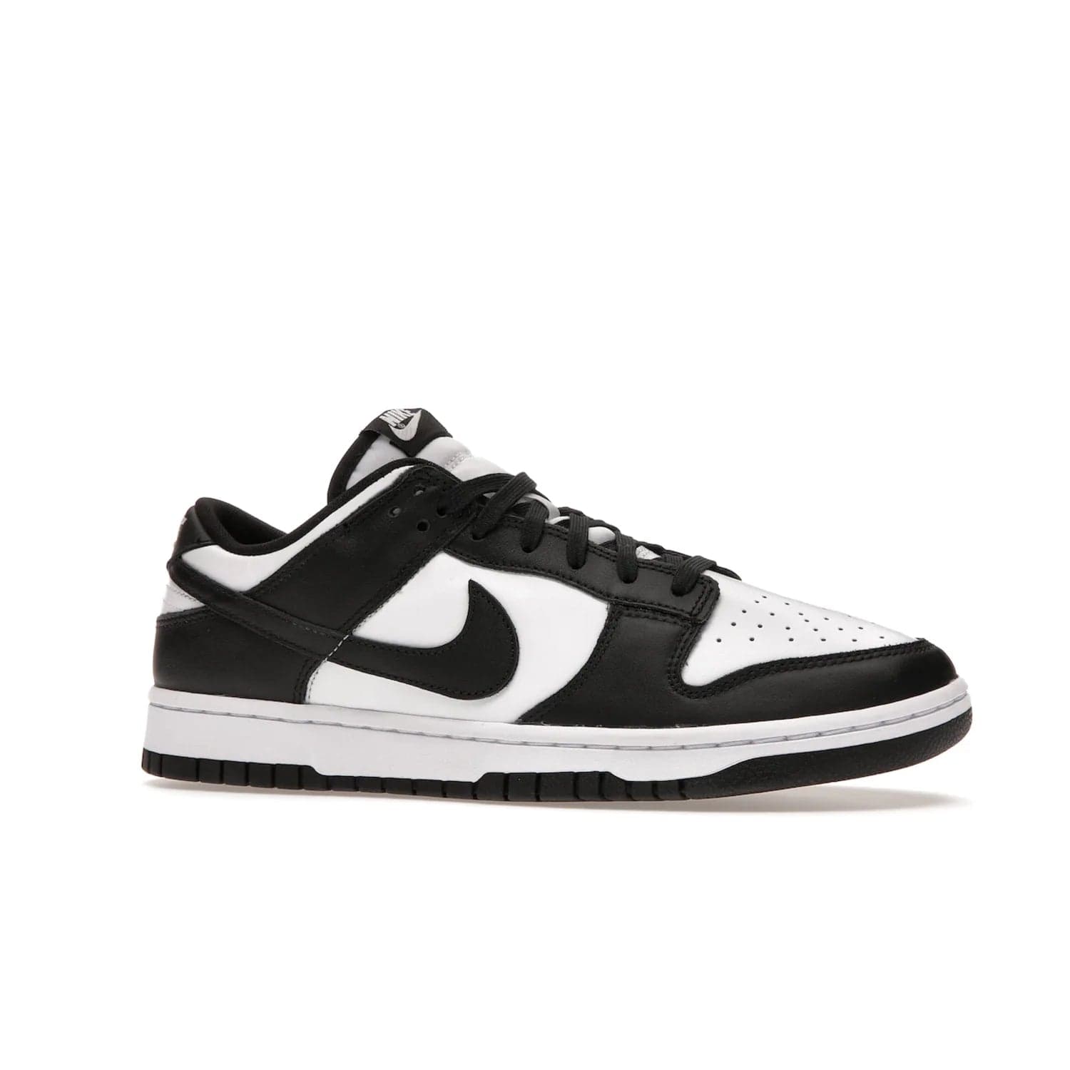 Nike Dunk Low Retro White Black Panda (2021) - Image 3 - Only at www.BallersClubKickz.com - Shop the Nike Dunk Low Retro White Black for classic styling featuring white leather with black leather overlays and classic Nike branding. Released in 2021, this timeless design offers a white midsole and black outsole for a stylish look. Shop all the Nike Dunks & rock this classic look.