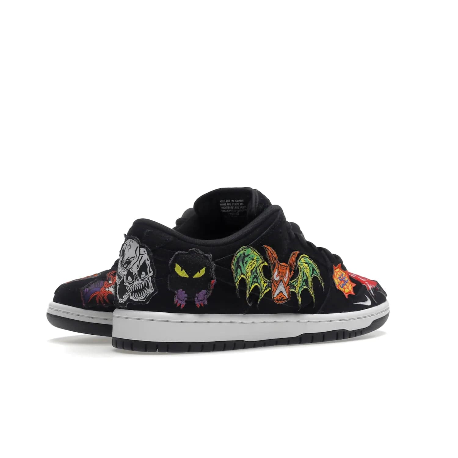 Nike SB Dunk Low Pro QS Neckface - Image 33 - Only at www.BallersClubKickz.com - Introducing the Nike SB Dunk Low Pro QS Neckface. Get spooky street style with black nubuck uppers featuring ghouls, tombstones, skulls, and more. The perfect mix of eye-catching details and a white midsole. Available now.