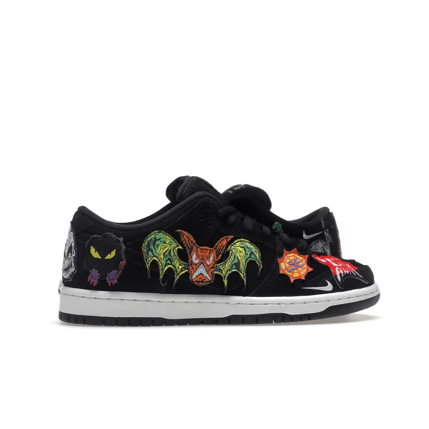 Nike SB Dunk Low Pro QS Neckface - Image 36 - Only at www.BallersClubKickz.com - Introducing the Nike SB Dunk Low Pro QS Neckface. Get spooky street style with black nubuck uppers featuring ghouls, tombstones, skulls, and more. The perfect mix of eye-catching details and a white midsole. Available now.