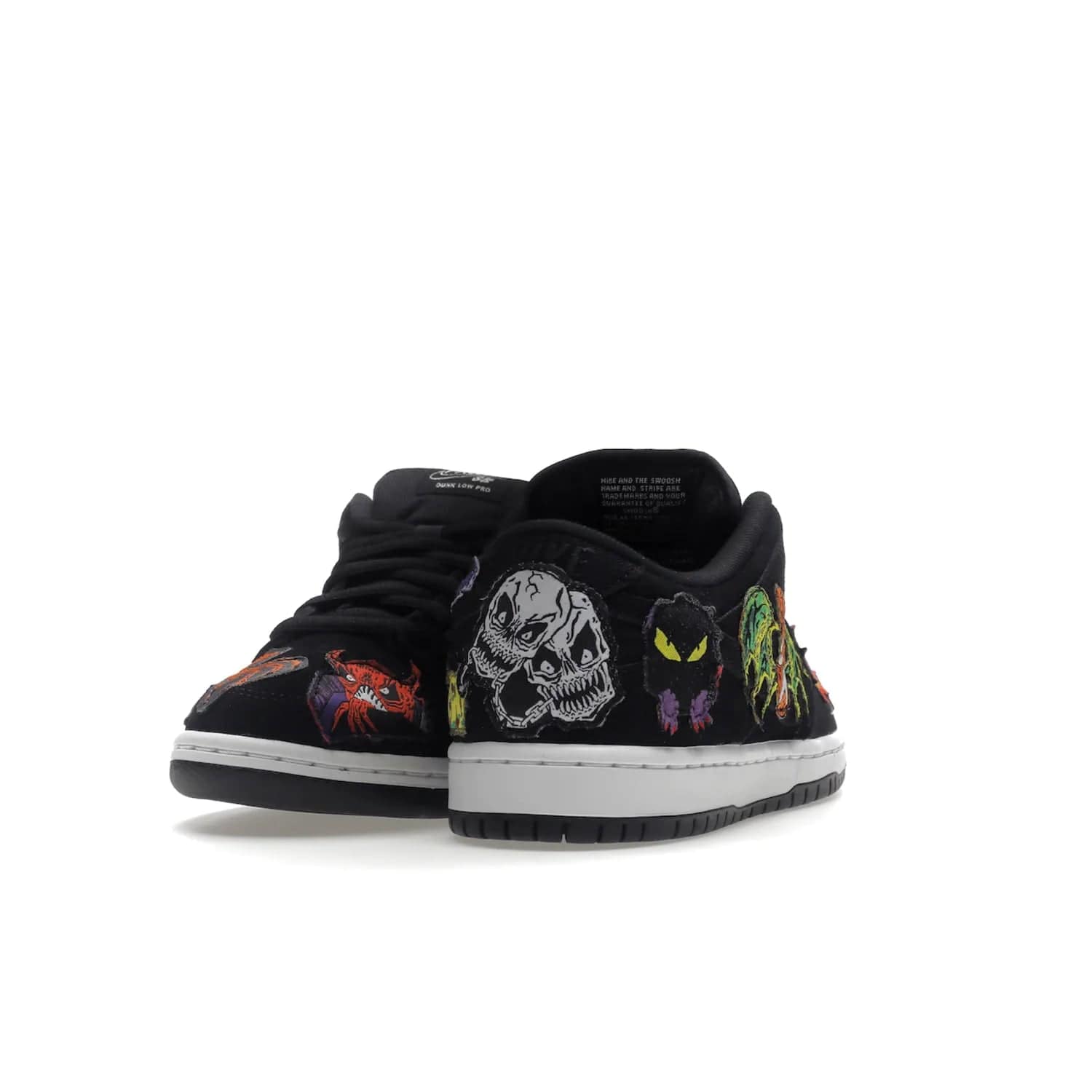 Nike SB Dunk Low Pro QS Neckface - Image 30 - Only at www.BallersClubKickz.com - Introducing the Nike SB Dunk Low Pro QS Neckface. Get spooky street style with black nubuck uppers featuring ghouls, tombstones, skulls, and more. The perfect mix of eye-catching details and a white midsole. Available now.