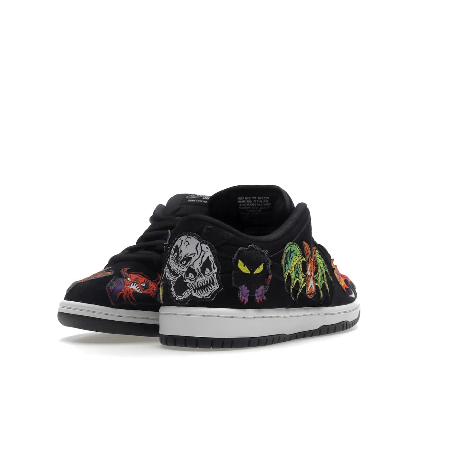 Nike SB Dunk Low Pro QS Neckface - Image 31 - Only at www.BallersClubKickz.com - Introducing the Nike SB Dunk Low Pro QS Neckface. Get spooky street style with black nubuck uppers featuring ghouls, tombstones, skulls, and more. The perfect mix of eye-catching details and a white midsole. Available now.