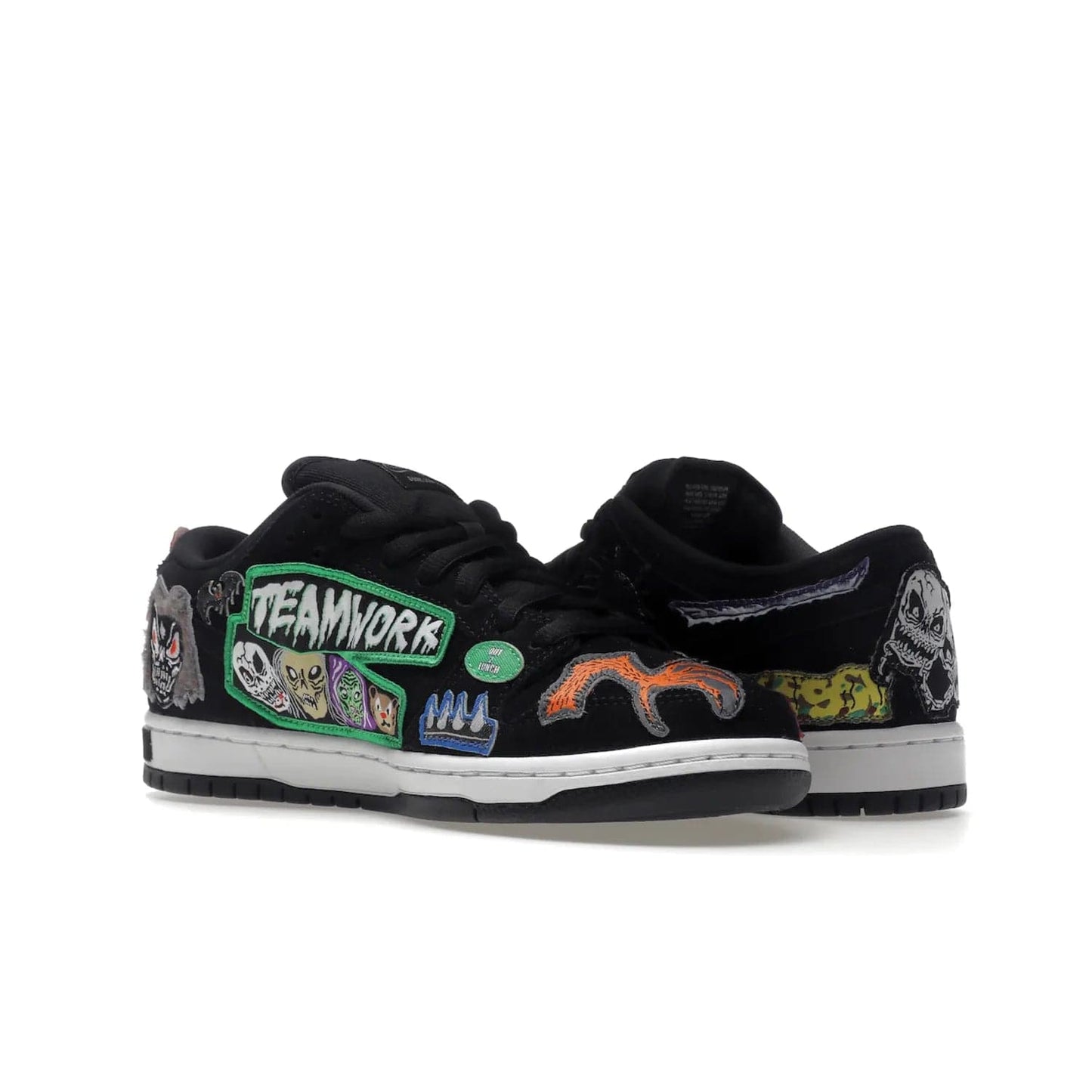 Nike SB Dunk Low Pro QS Neckface - Image 23 - Only at www.BallersClubKickz.com - Introducing the Nike SB Dunk Low Pro QS Neckface. Get spooky street style with black nubuck uppers featuring ghouls, tombstones, skulls, and more. The perfect mix of eye-catching details and a white midsole. Available now.