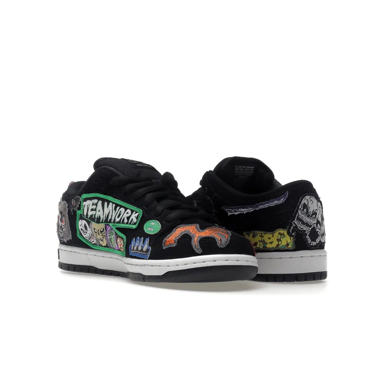 Nike SB Dunk Low Pro QS Neckface - Image 24 - Only at www.BallersClubKickz.com - Introducing the Nike SB Dunk Low Pro QS Neckface. Get spooky street style with black nubuck uppers featuring ghouls, tombstones, skulls, and more. The perfect mix of eye-catching details and a white midsole. Available now.