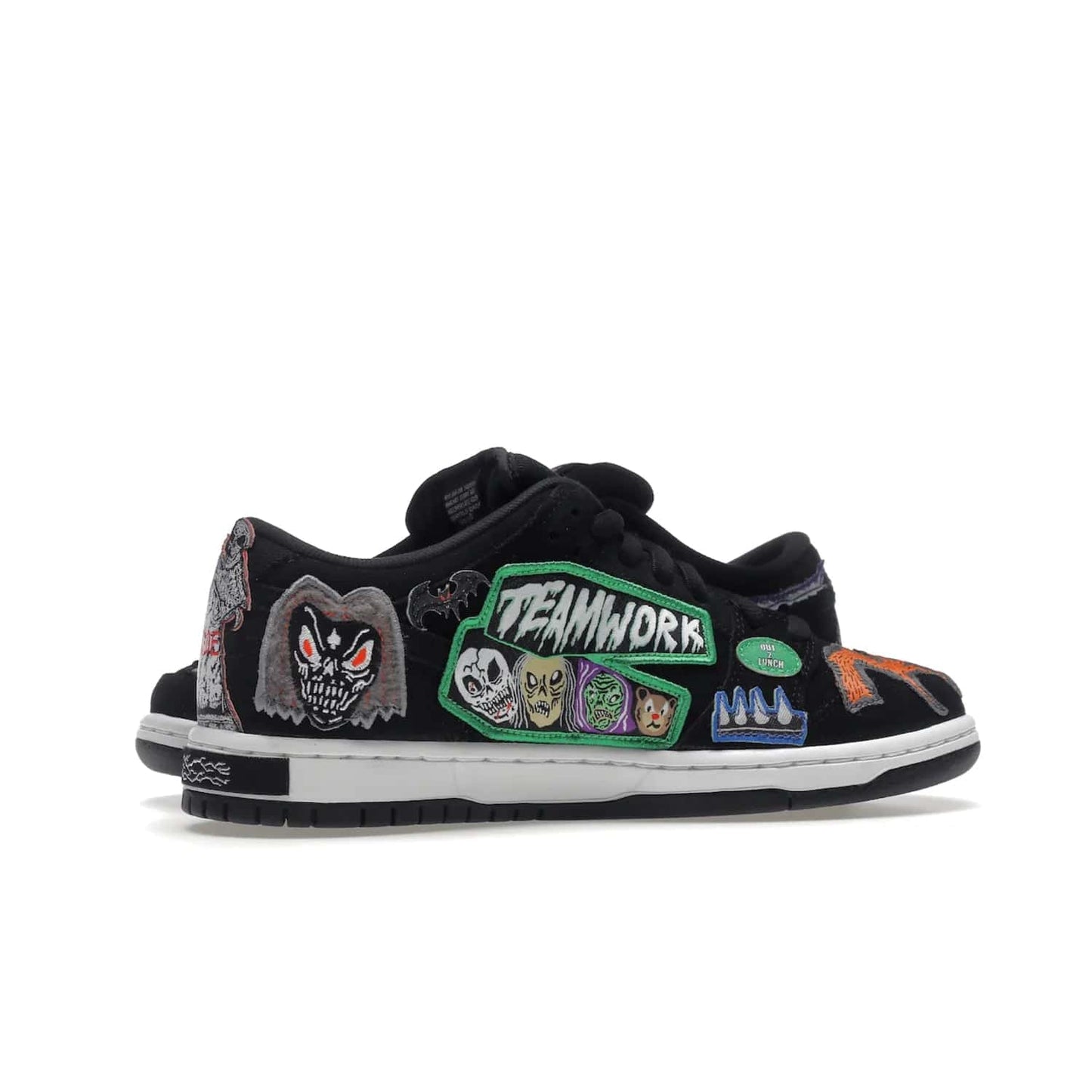 Nike SB Dunk Low Pro QS Neckface - Image 17 - Only at www.BallersClubKickz.com - Introducing the Nike SB Dunk Low Pro QS Neckface. Get spooky street style with black nubuck uppers featuring ghouls, tombstones, skulls, and more. The perfect mix of eye-catching details and a white midsole. Available now.