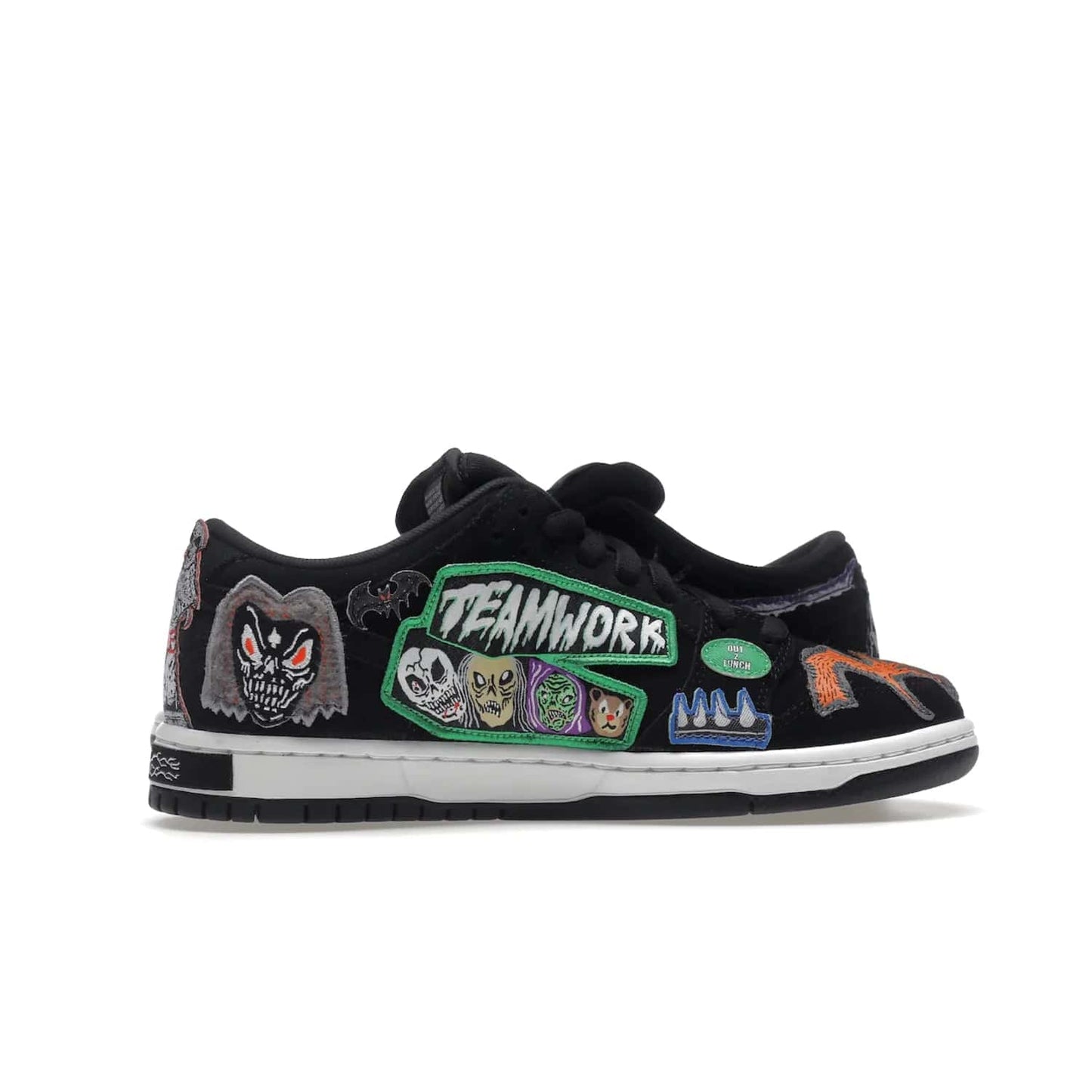 Nike SB Dunk Low Pro QS Neckface - Image 18 - Only at www.BallersClubKickz.com - Introducing the Nike SB Dunk Low Pro QS Neckface. Get spooky street style with black nubuck uppers featuring ghouls, tombstones, skulls, and more. The perfect mix of eye-catching details and a white midsole. Available now.