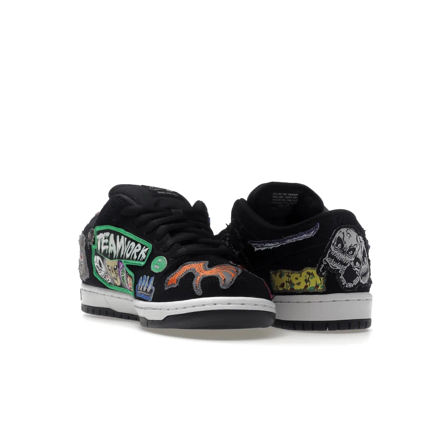Nike SB Dunk Low Pro QS Neckface - Image 25 - Only at www.BallersClubKickz.com - Introducing the Nike SB Dunk Low Pro QS Neckface. Get spooky street style with black nubuck uppers featuring ghouls, tombstones, skulls, and more. The perfect mix of eye-catching details and a white midsole. Available now.