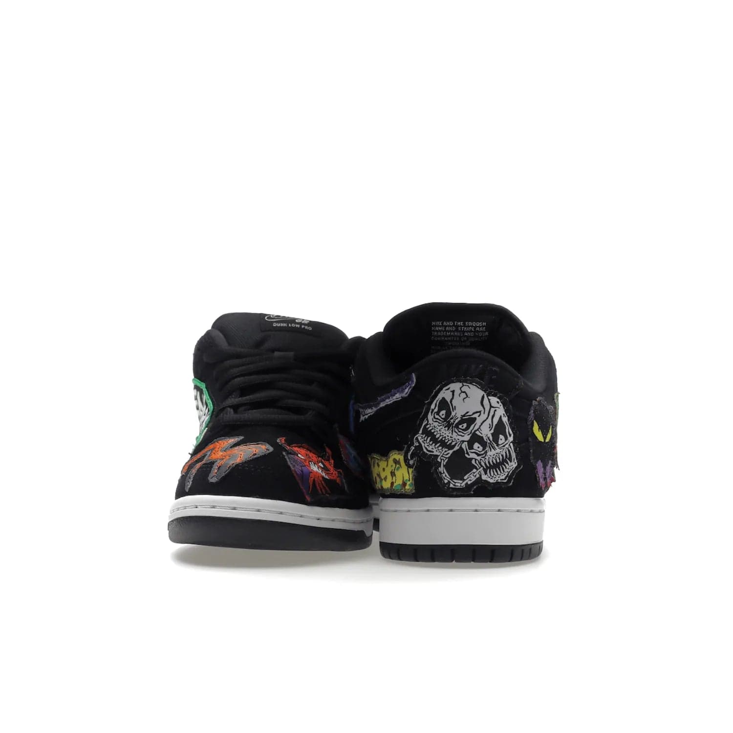 Nike SB Dunk Low Pro QS Neckface - Image 28 - Only at www.BallersClubKickz.com - Introducing the Nike SB Dunk Low Pro QS Neckface. Get spooky street style with black nubuck uppers featuring ghouls, tombstones, skulls, and more. The perfect mix of eye-catching details and a white midsole. Available now.