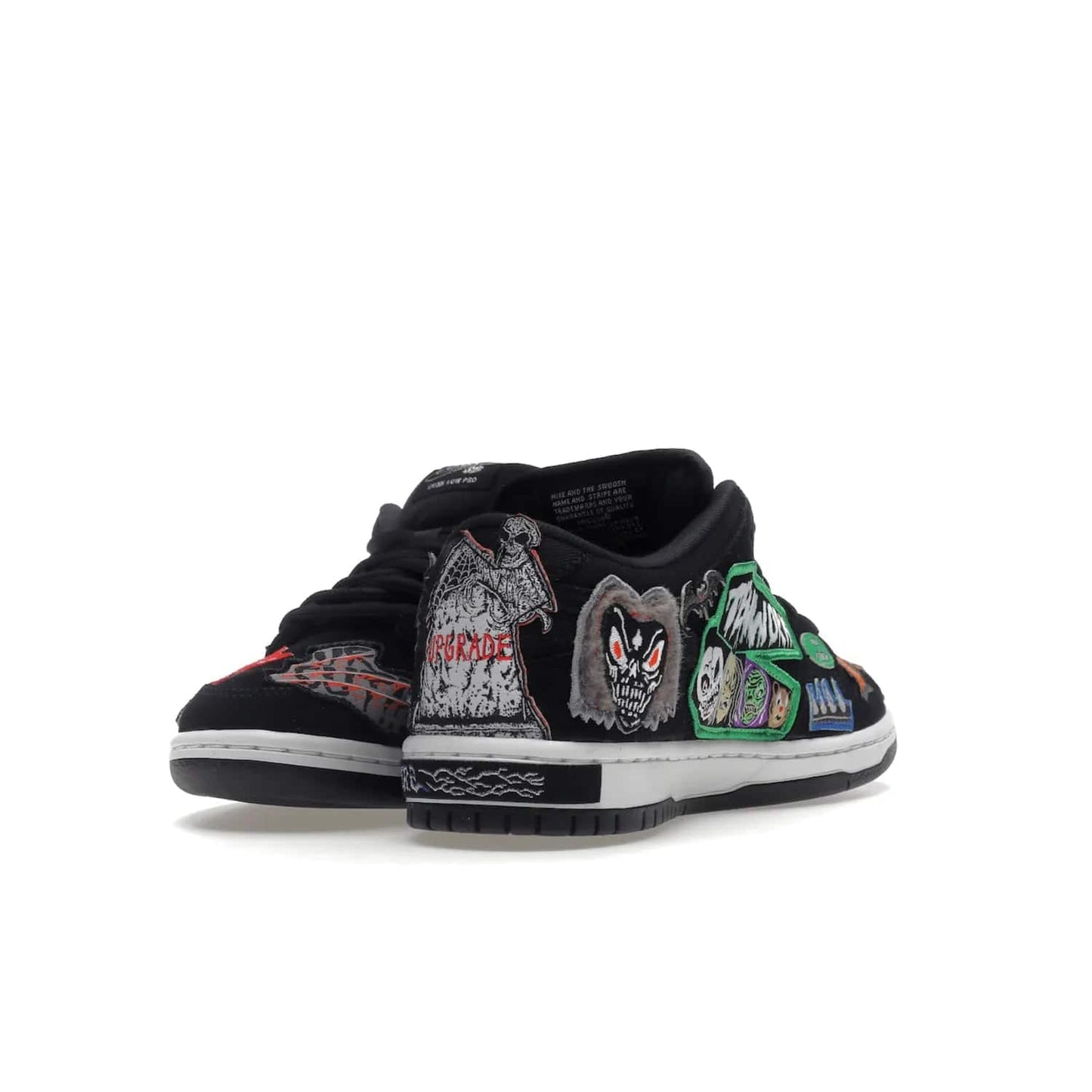 Nike SB Dunk Low Pro QS Neckface - Image 13 - Only at www.BallersClubKickz.com - Introducing the Nike SB Dunk Low Pro QS Neckface. Get spooky street style with black nubuck uppers featuring ghouls, tombstones, skulls, and more. The perfect mix of eye-catching details and a white midsole. Available now.