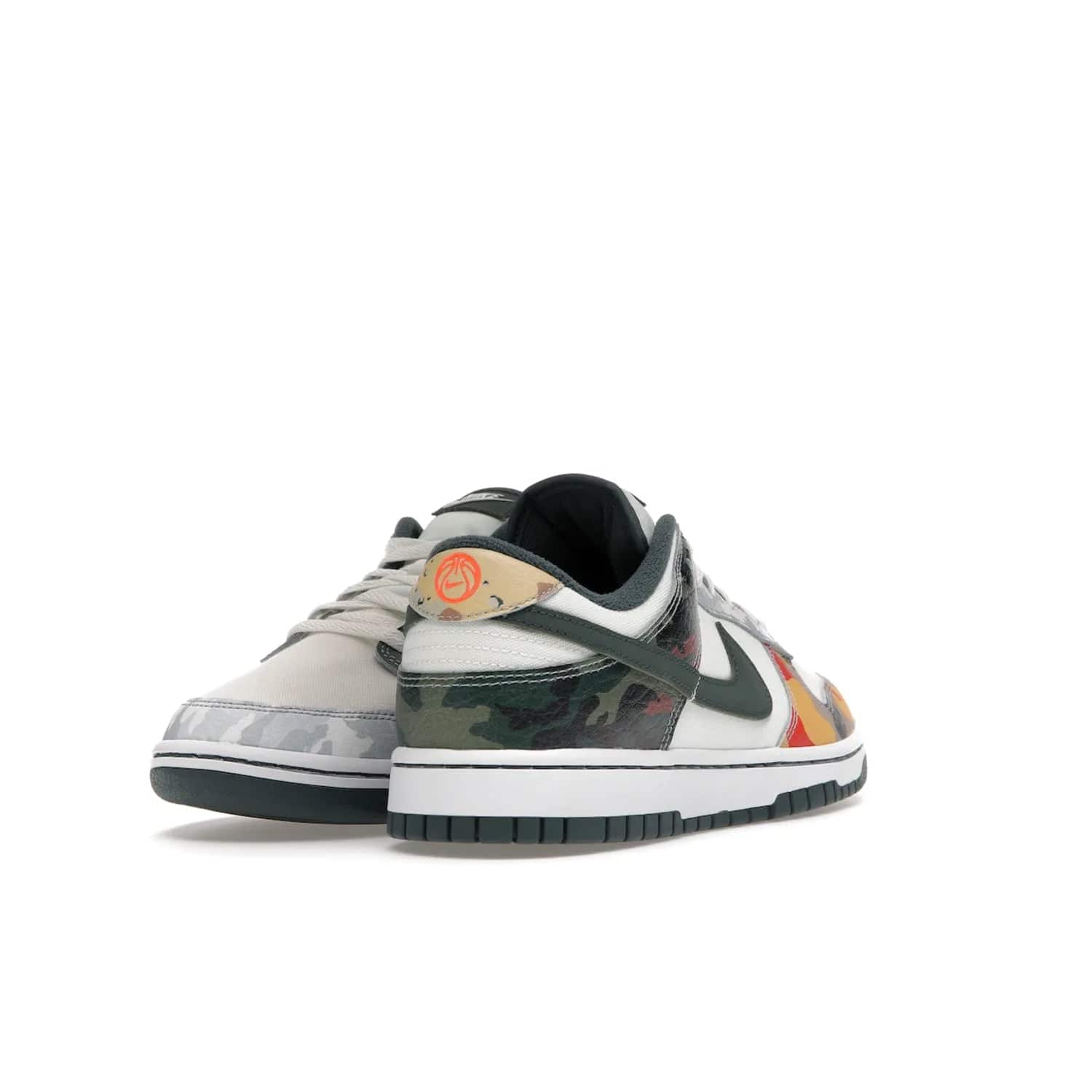 Nike Dunk Low SE Sail Multi-Camo - Image 31 - Only at www.BallersClubKickz.com - Classic design meets statement style in the Nike Dunk Low SE Sail Multi-Camo. White leather base with multi-color camo overlays, vibrant Nike Swooshes, and orange Nike embroidery. Get yours August 2021.
