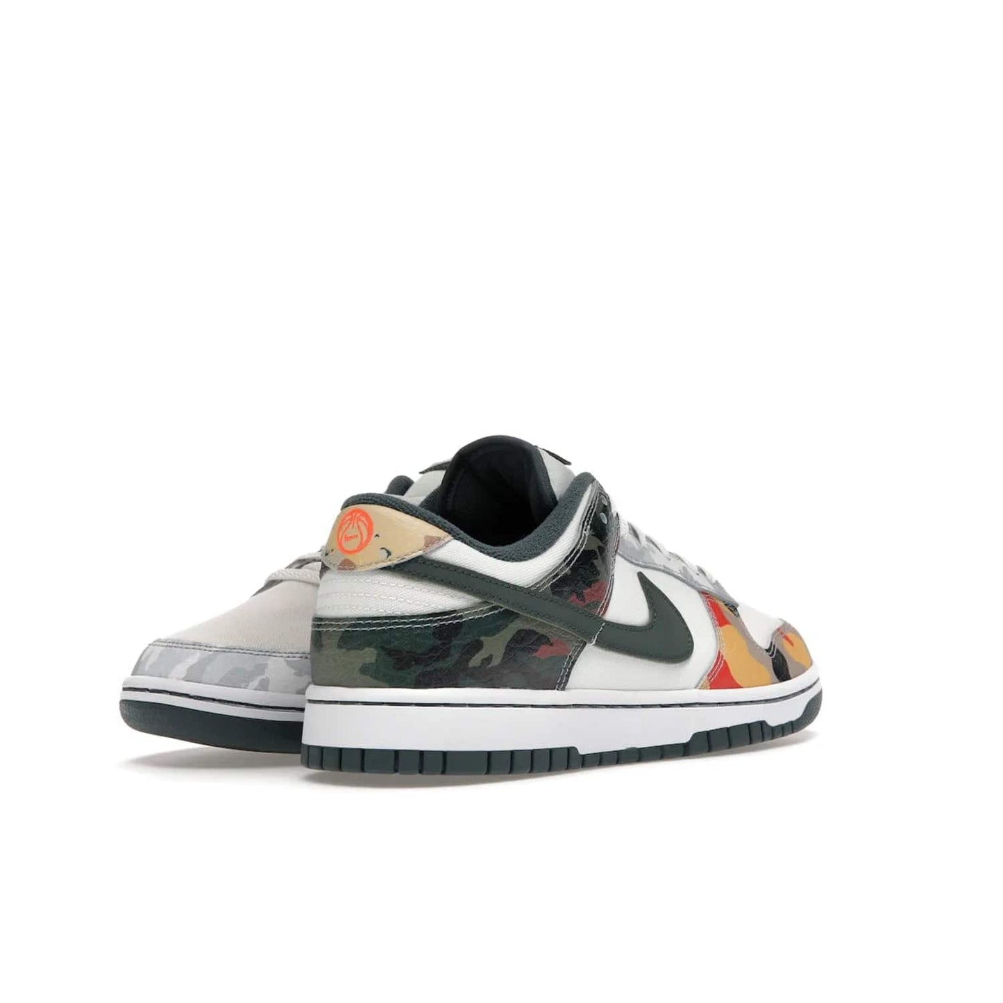 Nike Dunk Low SE Sail Multi-Camo - Image 32 - Only at www.BallersClubKickz.com - Classic design meets statement style in the Nike Dunk Low SE Sail Multi-Camo. White leather base with multi-color camo overlays, vibrant Nike Swooshes, and orange Nike embroidery. Get yours August 2021.