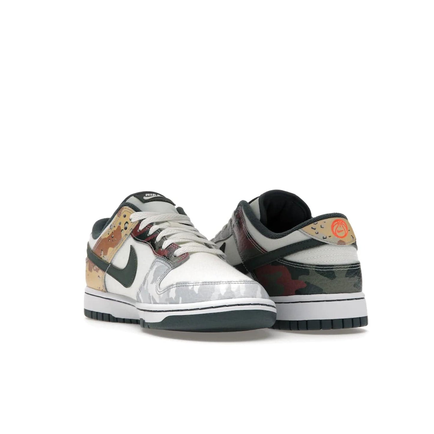 Nike Dunk Low SE Sail Multi-Camo - Image 25 - Only at www.BallersClubKickz.com - Classic design meets statement style in the Nike Dunk Low SE Sail Multi-Camo. White leather base with multi-color camo overlays, vibrant Nike Swooshes, and orange Nike embroidery. Get yours August 2021.