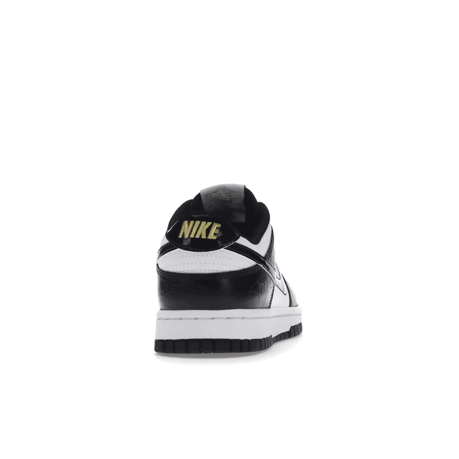 Nike Dunk Low SE World Champs Black White - Image 29 - Only at www.BallersClubKickz.com - Step up your look with the Nike Dunk Low SE World Champs Black White. Leather base, lace eyelets, Swoosh design, gold-stitched brand, and black and gold lace dubraes. Get it in May 2022 for $120.