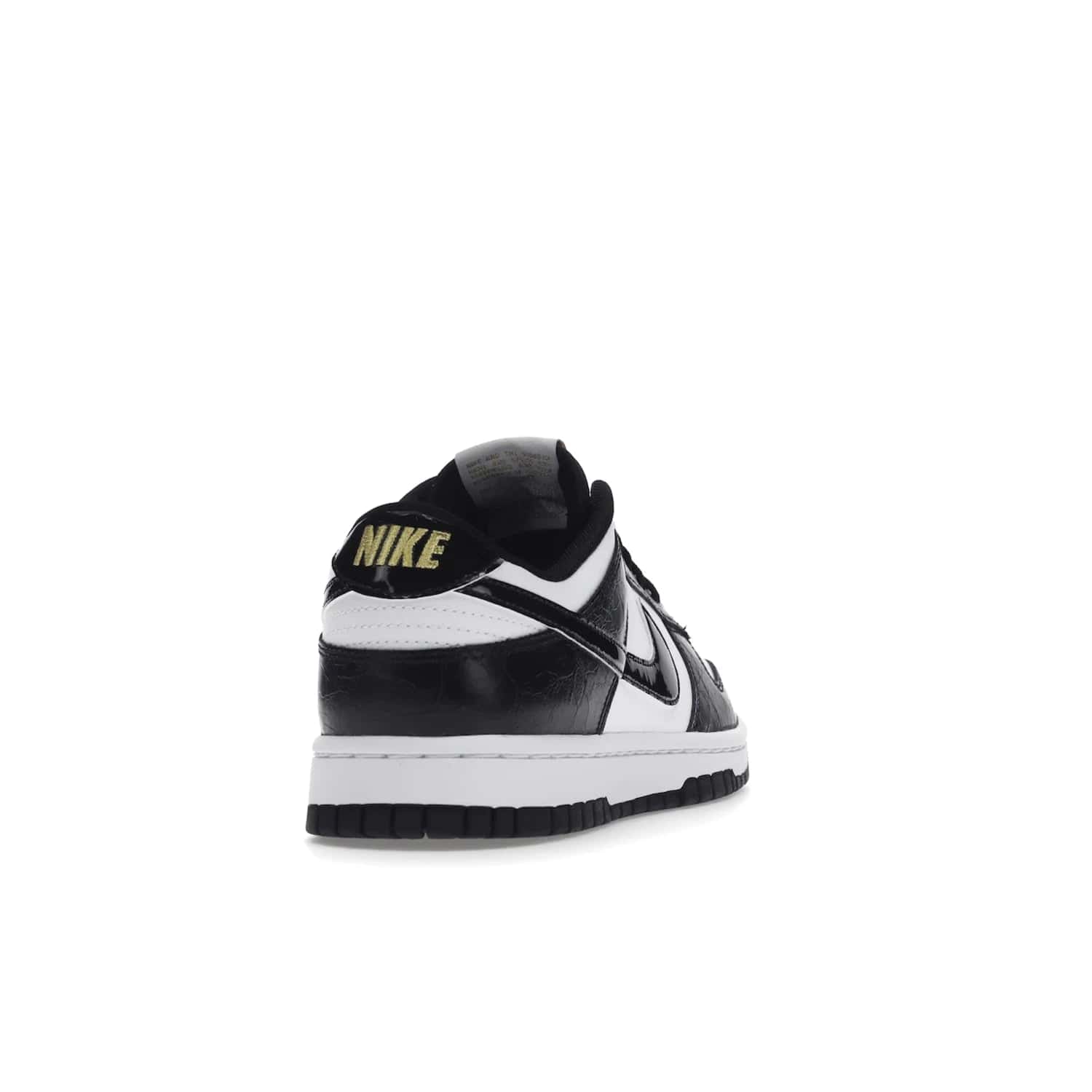 Nike Dunk Low SE World Champs Black White - Image 30 - Only at www.BallersClubKickz.com - Step up your look with the Nike Dunk Low SE World Champs Black White. Leather base, lace eyelets, Swoosh design, gold-stitched brand, and black and gold lace dubraes. Get it in May 2022 for $120.