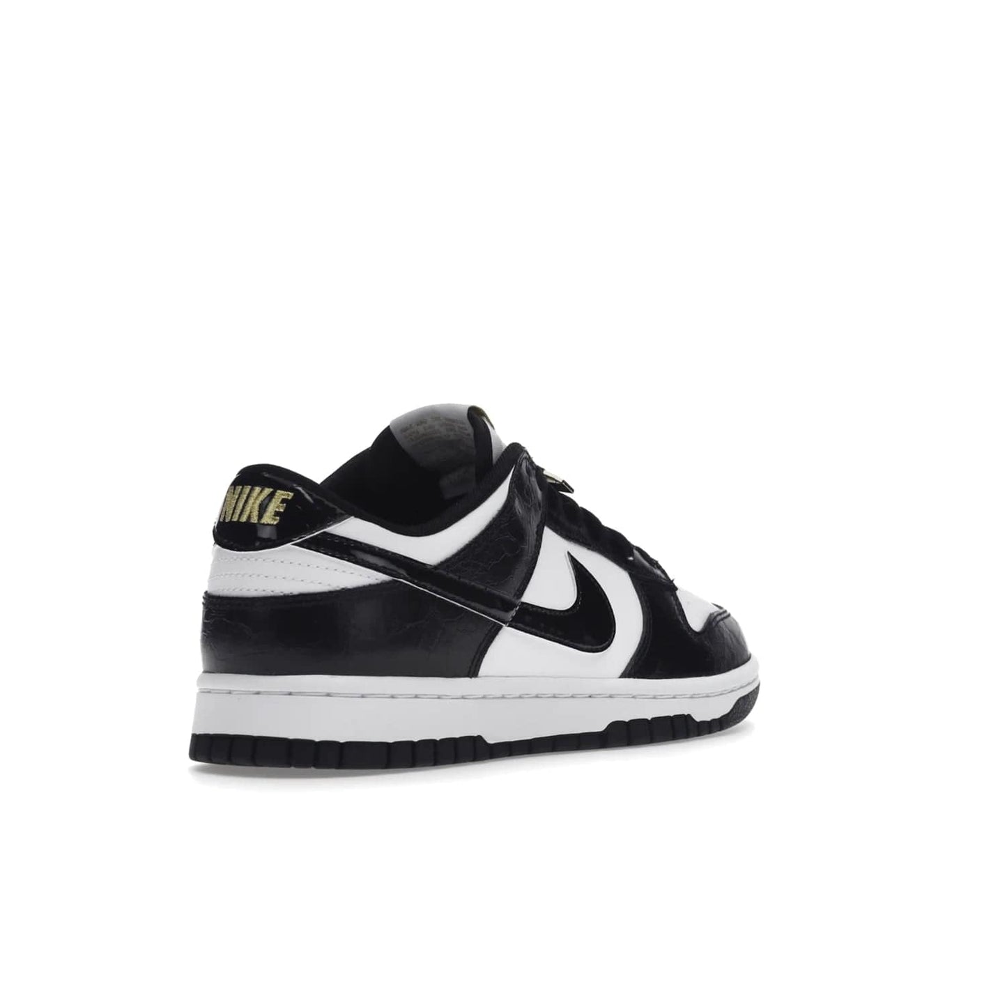 Nike Dunk Low SE World Champs Black White - Image 32 - Only at www.BallersClubKickz.com - Step up your look with the Nike Dunk Low SE World Champs Black White. Leather base, lace eyelets, Swoosh design, gold-stitched brand, and black and gold lace dubraes. Get it in May 2022 for $120.