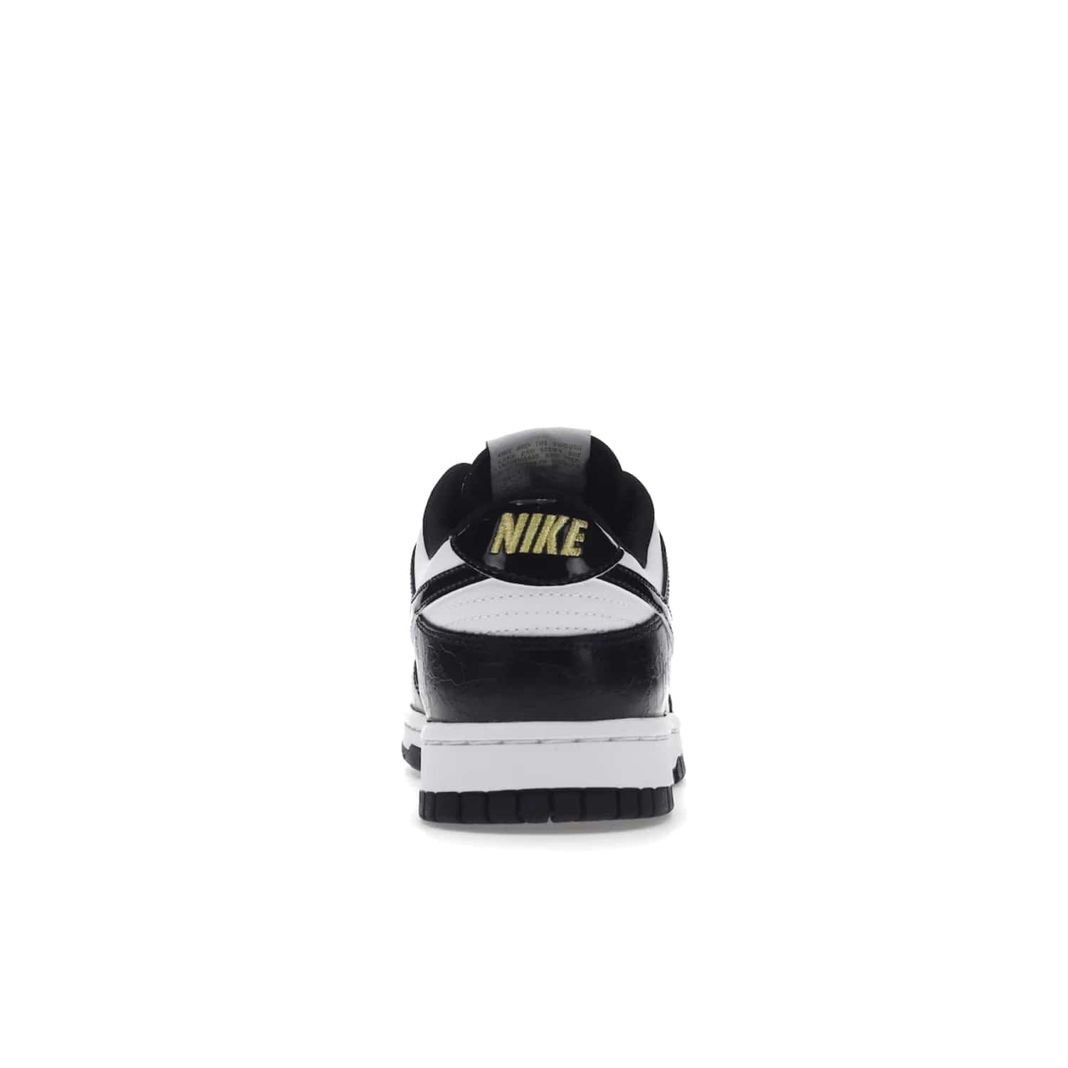 Nike Dunk Low SE World Champs Black White - Image 28 - Only at www.BallersClubKickz.com - Step up your look with the Nike Dunk Low SE World Champs Black White. Leather base, lace eyelets, Swoosh design, gold-stitched brand, and black and gold lace dubraes. Get it in May 2022 for $120.