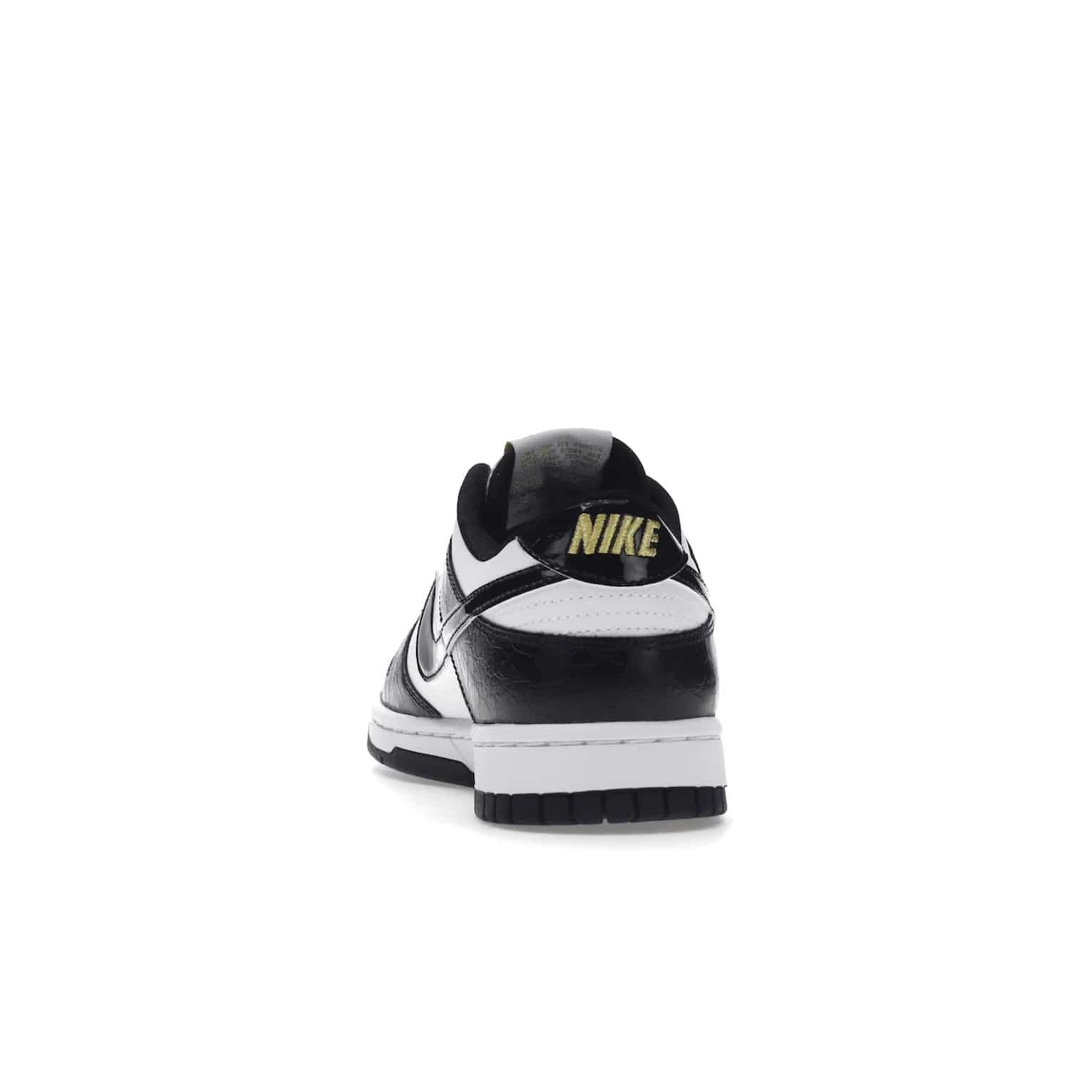 Nike Dunk Low SE World Champs Black White - Image 27 - Only at www.BallersClubKickz.com - Step up your look with the Nike Dunk Low SE World Champs Black White. Leather base, lace eyelets, Swoosh design, gold-stitched brand, and black and gold lace dubraes. Get it in May 2022 for $120.