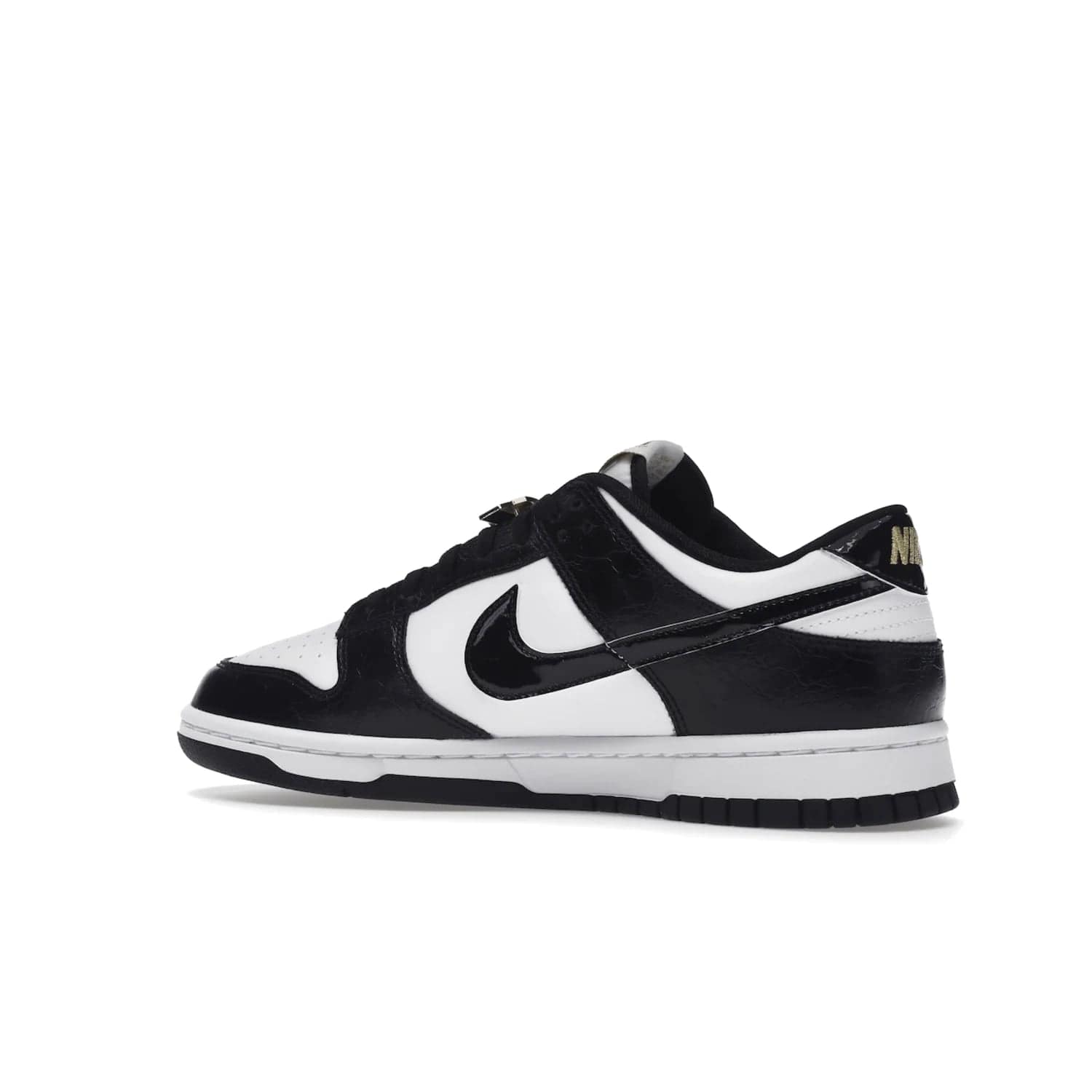 Nike Dunk Low SE World Champs Black White - Image 22 - Only at www.BallersClubKickz.com - Step up your look with the Nike Dunk Low SE World Champs Black White. Leather base, lace eyelets, Swoosh design, gold-stitched brand, and black and gold lace dubraes. Get it in May 2022 for $120.