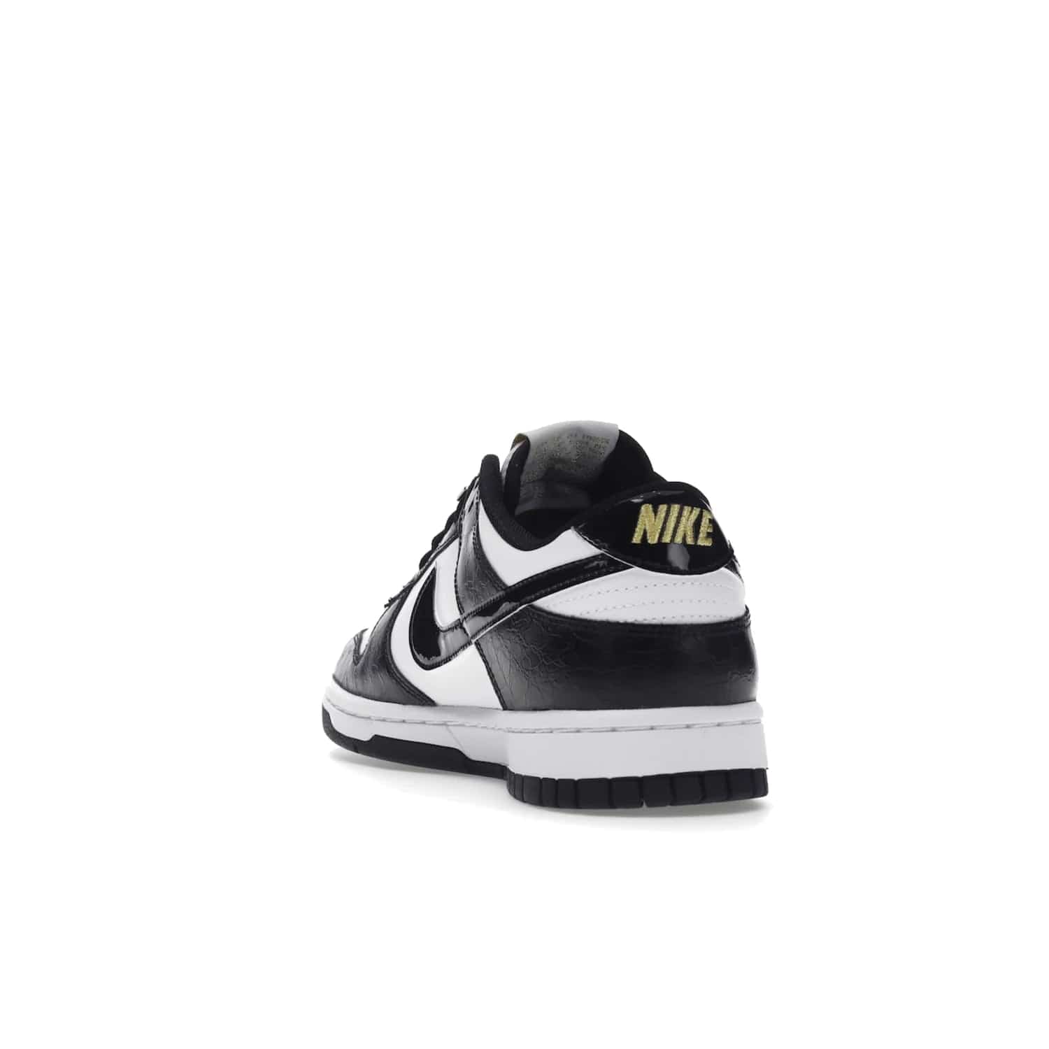 Nike Dunk Low SE World Champs Black White - Image 26 - Only at www.BallersClubKickz.com - Step up your look with the Nike Dunk Low SE World Champs Black White. Leather base, lace eyelets, Swoosh design, gold-stitched brand, and black and gold lace dubraes. Get it in May 2022 for $120.
