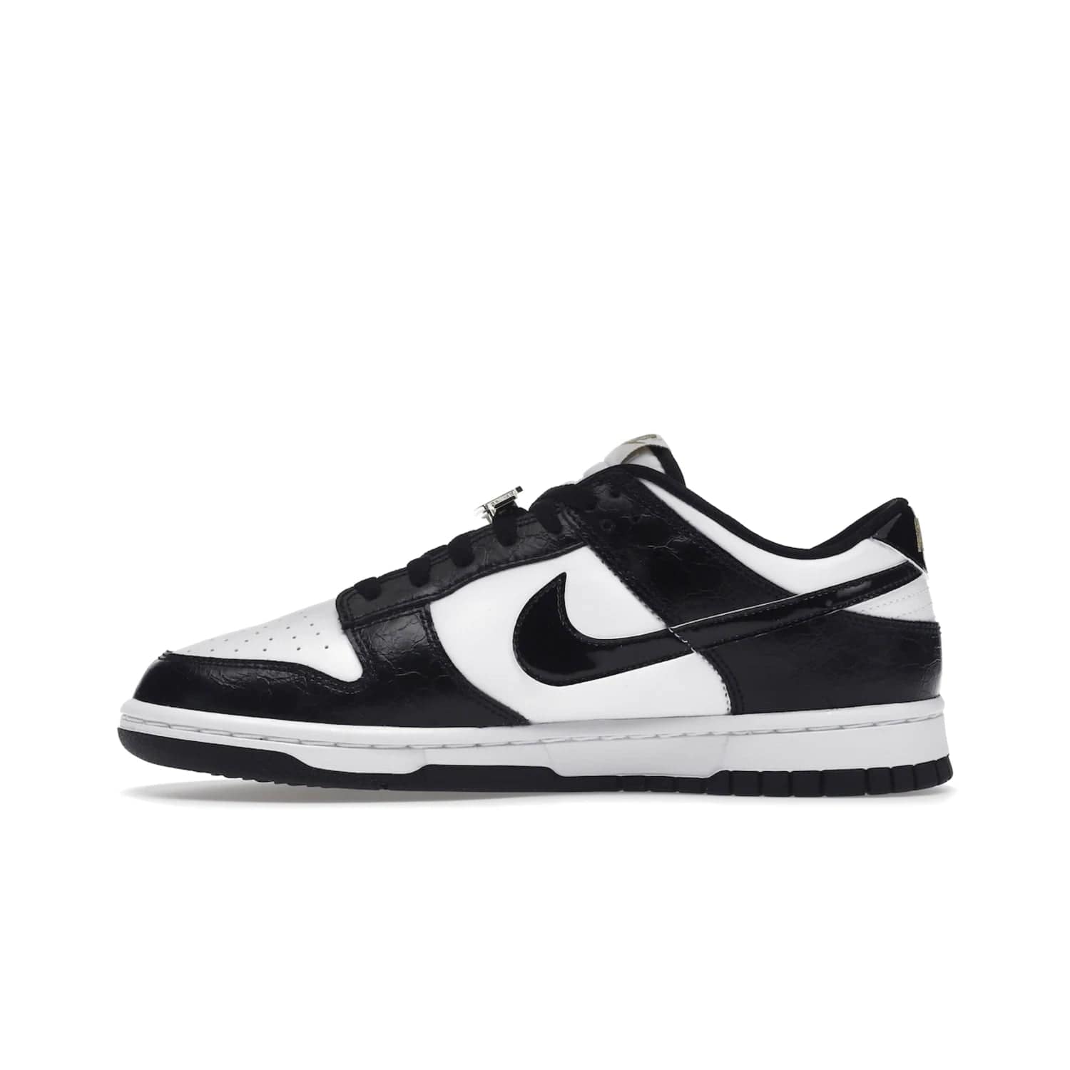 Nike Dunk Low SE World Champs Black White - Image 19 - Only at www.BallersClubKickz.com - Step up your look with the Nike Dunk Low SE World Champs Black White. Leather base, lace eyelets, Swoosh design, gold-stitched brand, and black and gold lace dubraes. Get it in May 2022 for $120.