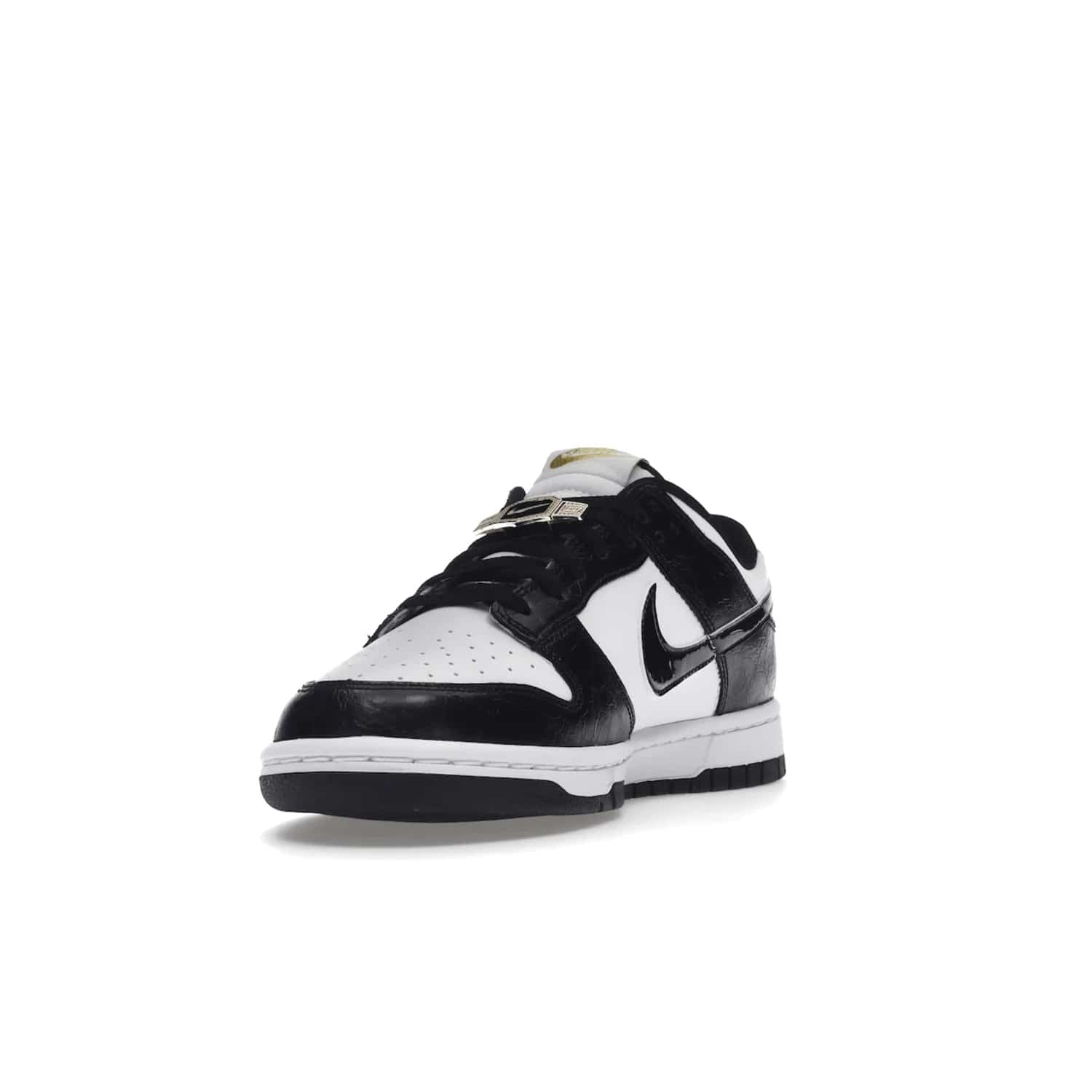 Nike Dunk Low SE World Champs Black White - Image 13 - Only at www.BallersClubKickz.com - Step up your look with the Nike Dunk Low SE World Champs Black White. Leather base, lace eyelets, Swoosh design, gold-stitched brand, and black and gold lace dubraes. Get it in May 2022 for $120.
