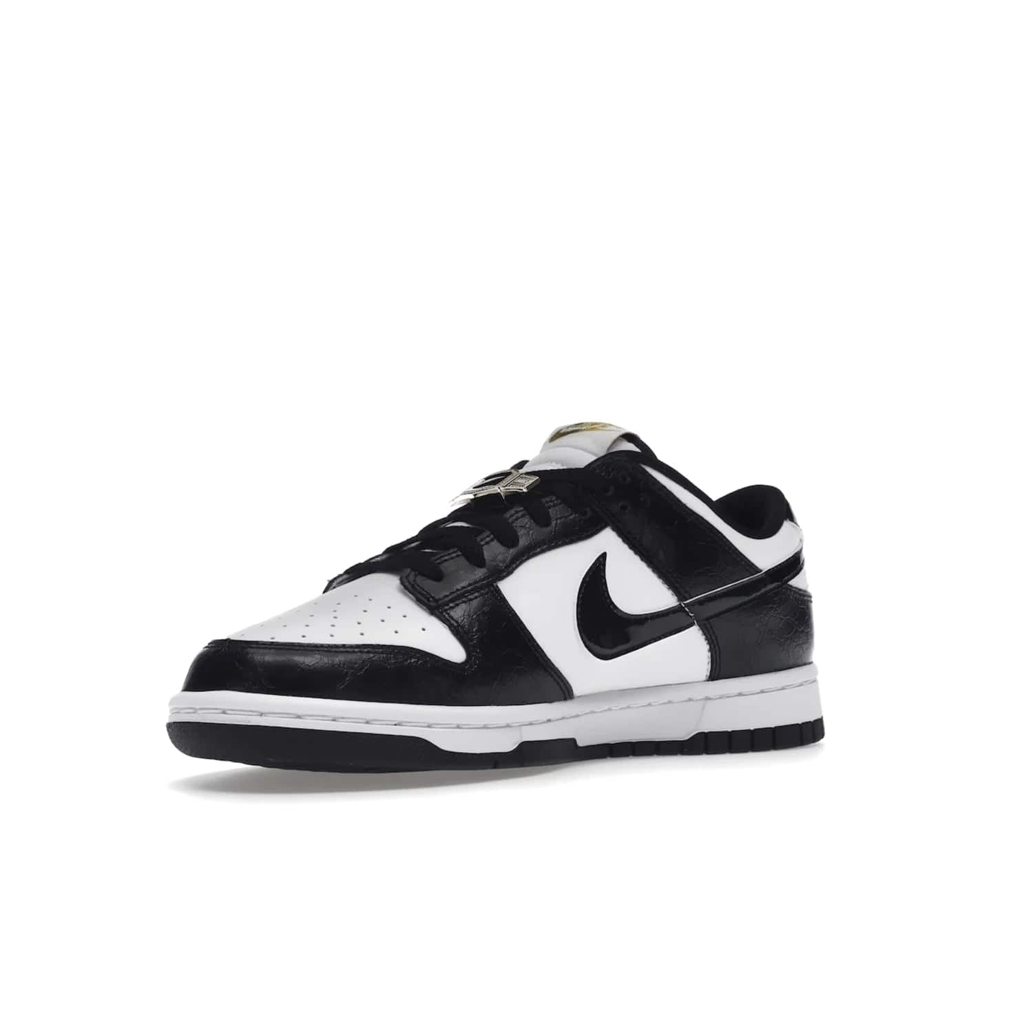 Nike Dunk Low SE World Champs Black White - Image 15 - Only at www.BallersClubKickz.com - Step up your look with the Nike Dunk Low SE World Champs Black White. Leather base, lace eyelets, Swoosh design, gold-stitched brand, and black and gold lace dubraes. Get it in May 2022 for $120.