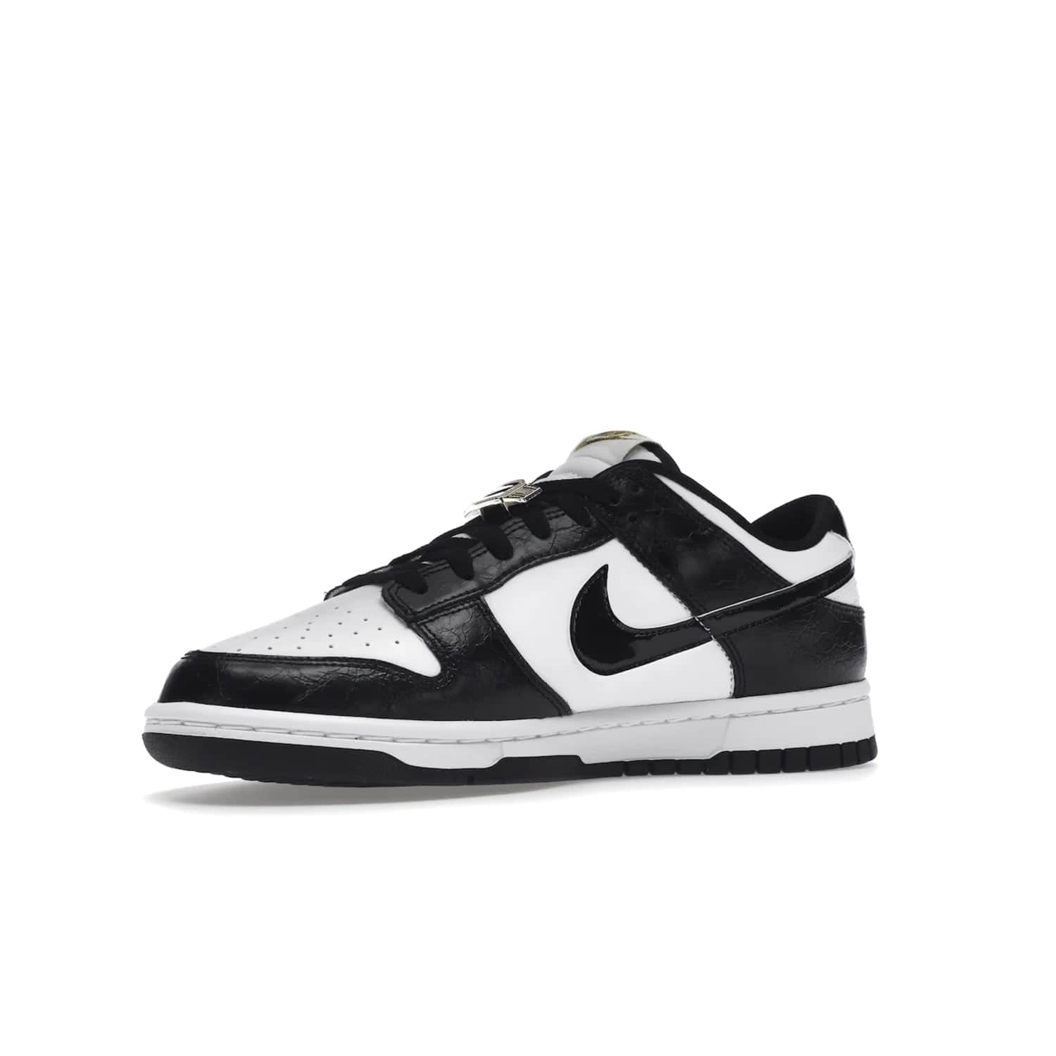 Nike Dunk Low SE World Champs Black White - Image 16 - Only at www.BallersClubKickz.com - Step up your look with the Nike Dunk Low SE World Champs Black White. Leather base, lace eyelets, Swoosh design, gold-stitched brand, and black and gold lace dubraes. Get it in May 2022 for $120.