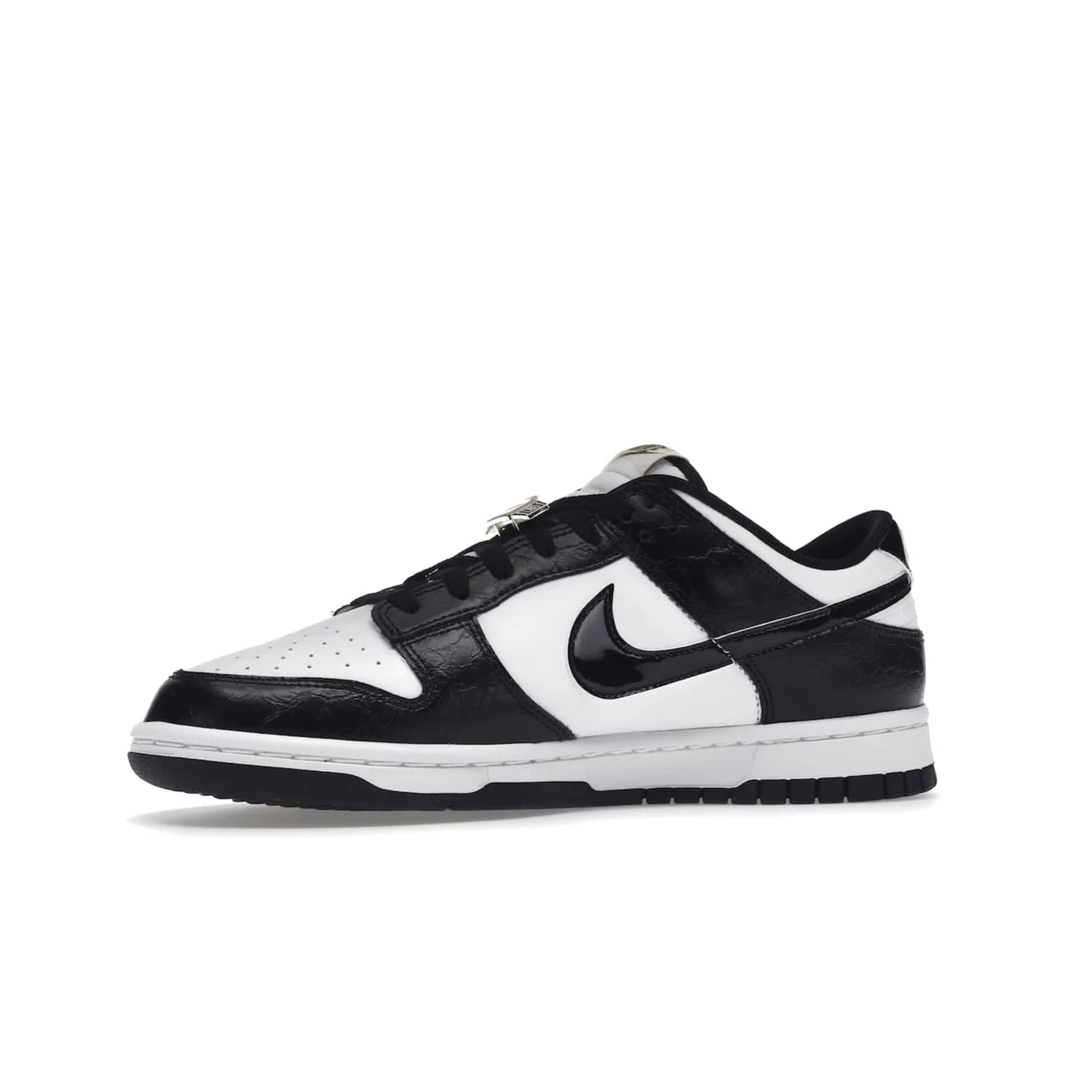 Nike Dunk Low SE World Champs Black White - Image 17 - Only at www.BallersClubKickz.com - Step up your look with the Nike Dunk Low SE World Champs Black White. Leather base, lace eyelets, Swoosh design, gold-stitched brand, and black and gold lace dubraes. Get it in May 2022 for $120.