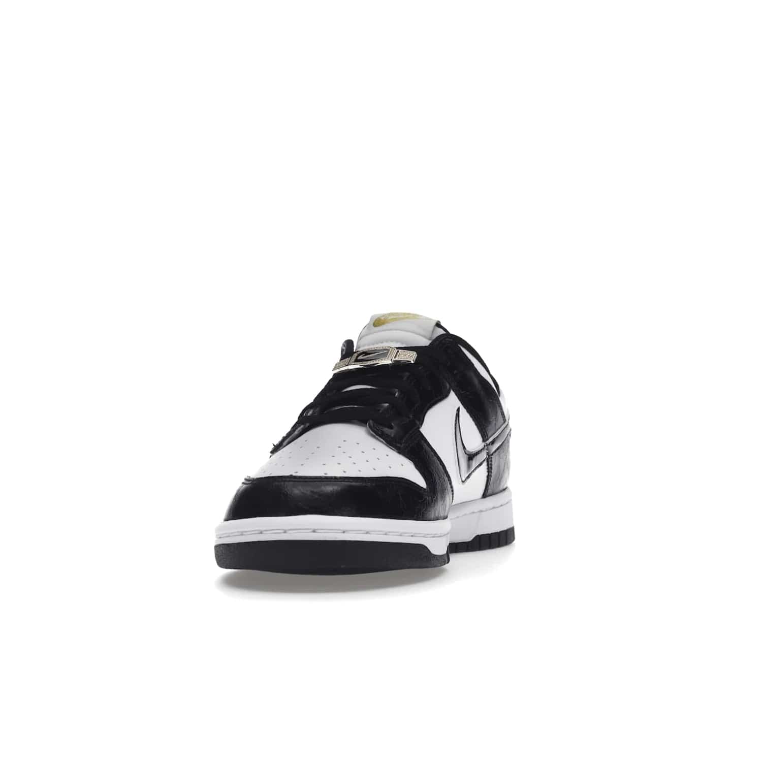 Nike Dunk Low SE World Champs Black White - Image 12 - Only at www.BallersClubKickz.com - Step up your look with the Nike Dunk Low SE World Champs Black White. Leather base, lace eyelets, Swoosh design, gold-stitched brand, and black and gold lace dubraes. Get it in May 2022 for $120.