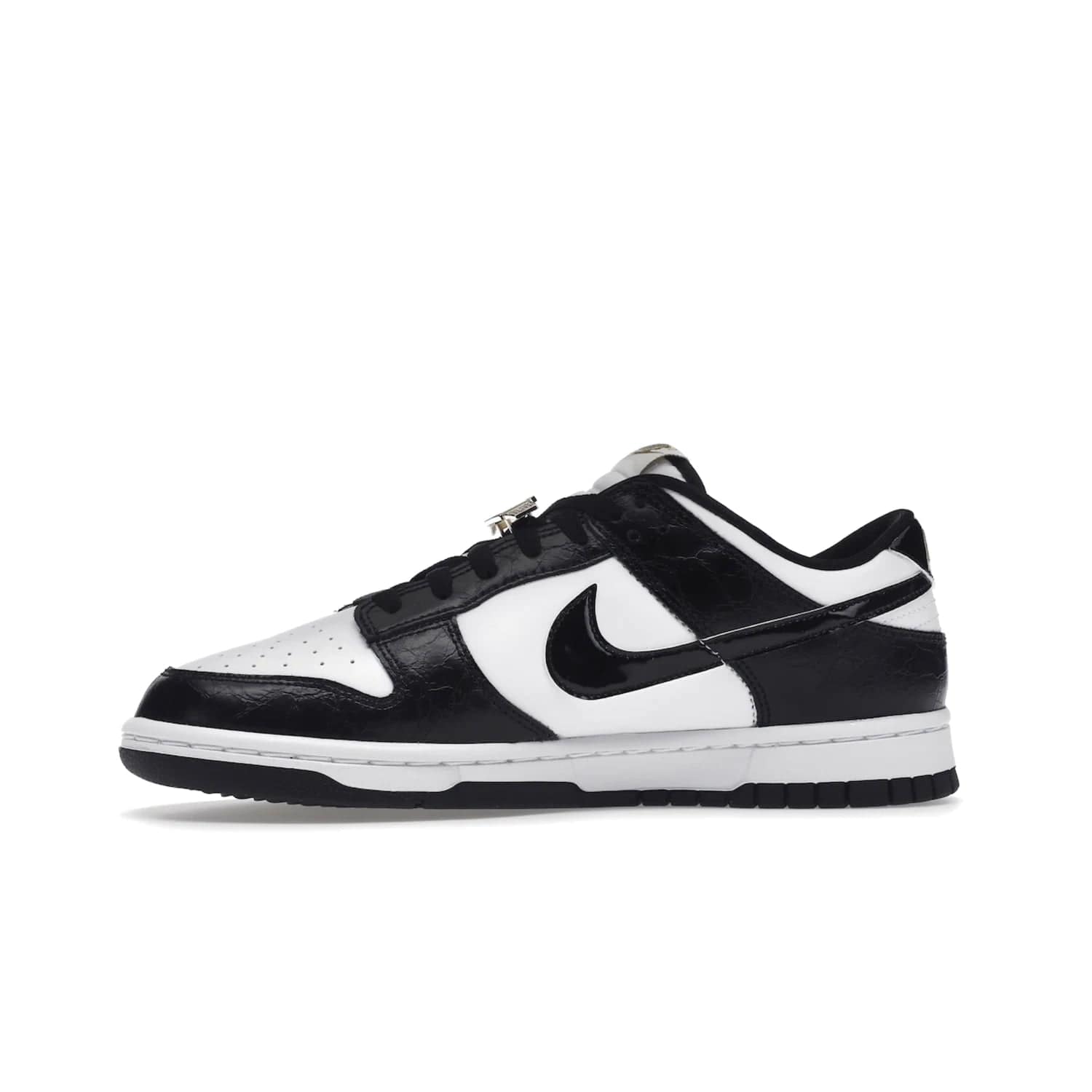 Nike Dunk Low SE World Champs Black White - Image 18 - Only at www.BallersClubKickz.com - Step up your look with the Nike Dunk Low SE World Champs Black White. Leather base, lace eyelets, Swoosh design, gold-stitched brand, and black and gold lace dubraes. Get it in May 2022 for $120.