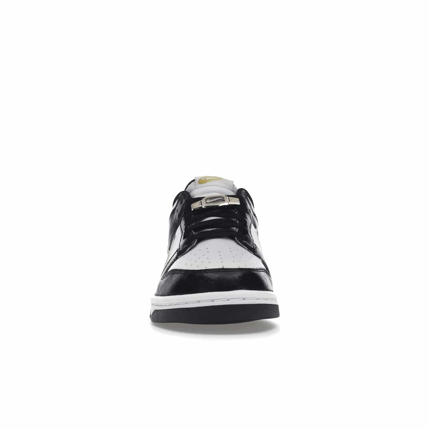 Nike Dunk Low SE World Champs Black White - Image 10 - Only at www.BallersClubKickz.com - Step up your look with the Nike Dunk Low SE World Champs Black White. Leather base, lace eyelets, Swoosh design, gold-stitched brand, and black and gold lace dubraes. Get it in May 2022 for $120.