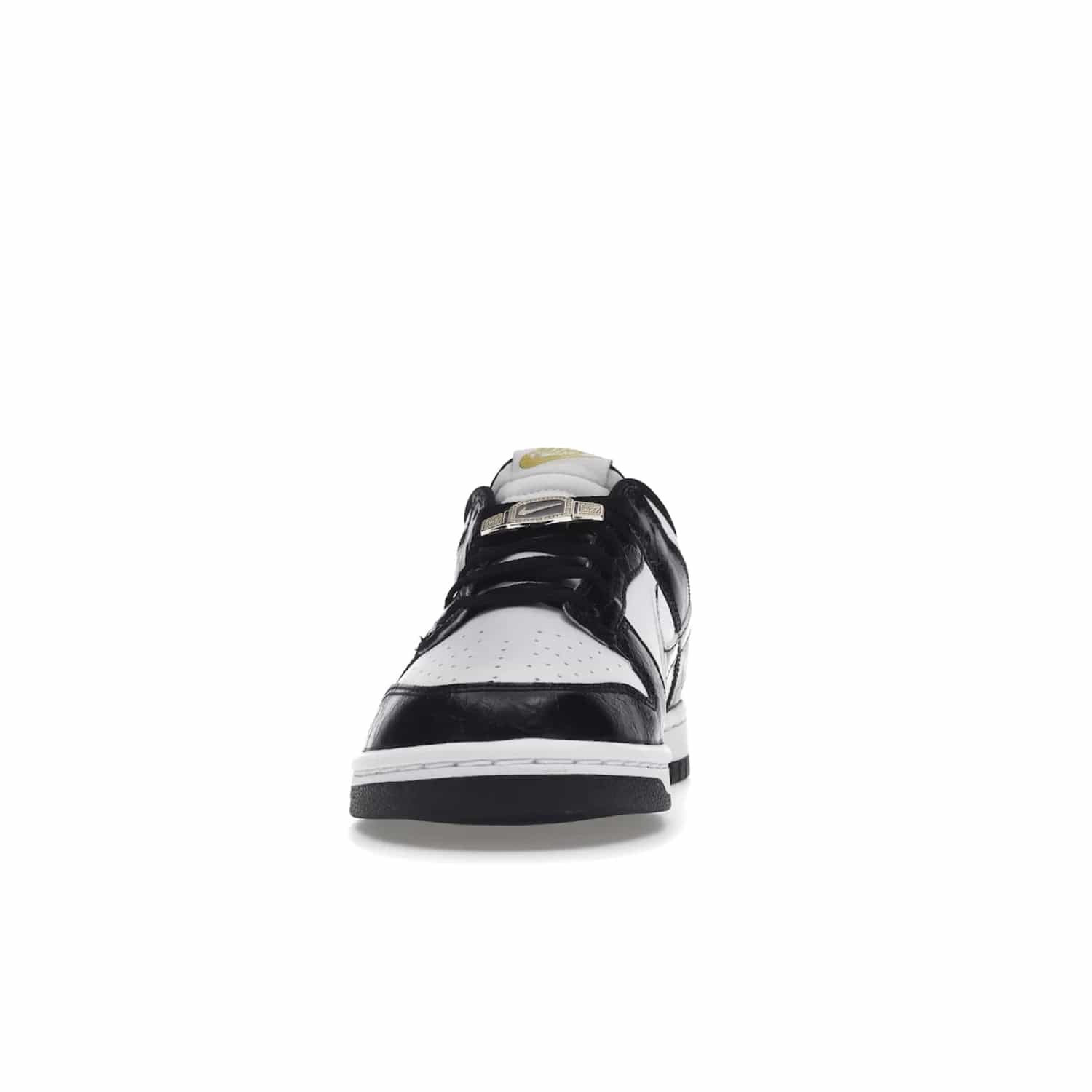Nike Dunk Low SE World Champs Black White - Image 11 - Only at www.BallersClubKickz.com - Step up your look with the Nike Dunk Low SE World Champs Black White. Leather base, lace eyelets, Swoosh design, gold-stitched brand, and black and gold lace dubraes. Get it in May 2022 for $120.