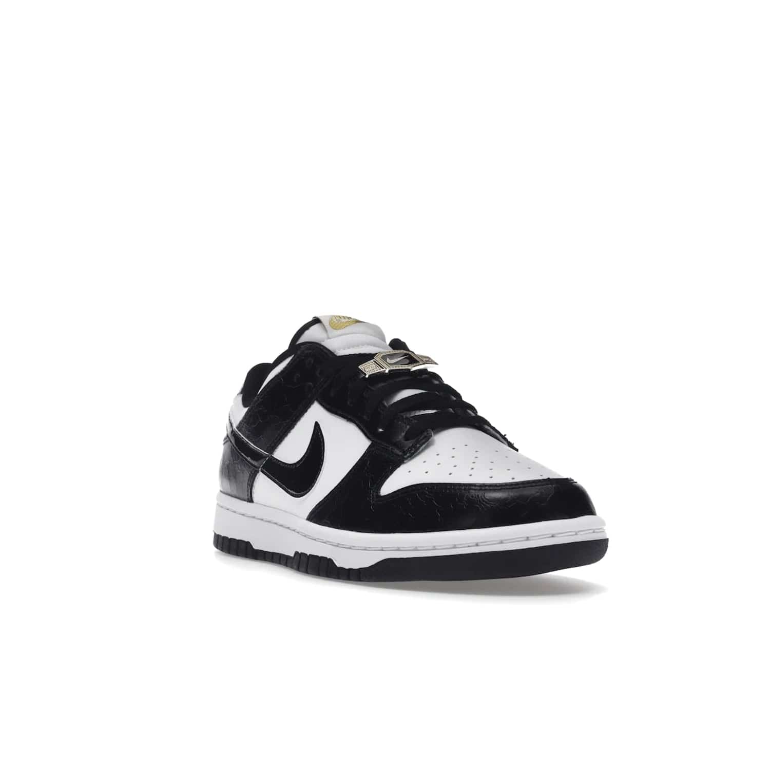 Nike Dunk Low SE World Champs Black White - Image 7 - Only at www.BallersClubKickz.com - Step up your look with the Nike Dunk Low SE World Champs Black White. Leather base, lace eyelets, Swoosh design, gold-stitched brand, and black and gold lace dubraes. Get it in May 2022 for $120.