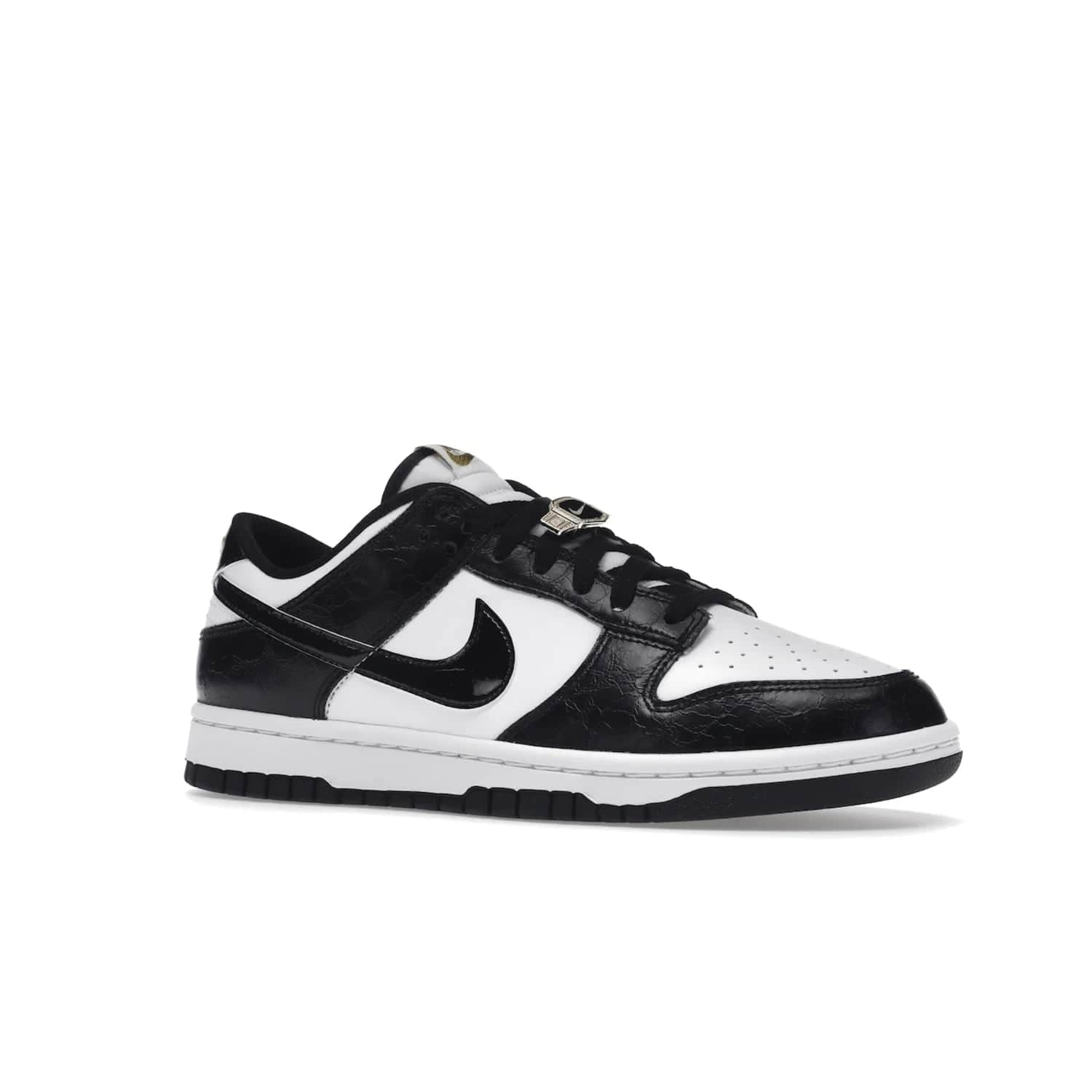 Nike Dunk Low SE World Champs Black White - Image 4 - Only at www.BallersClubKickz.com - Step up your look with the Nike Dunk Low SE World Champs Black White. Leather base, lace eyelets, Swoosh design, gold-stitched brand, and black and gold lace dubraes. Get it in May 2022 for $120.