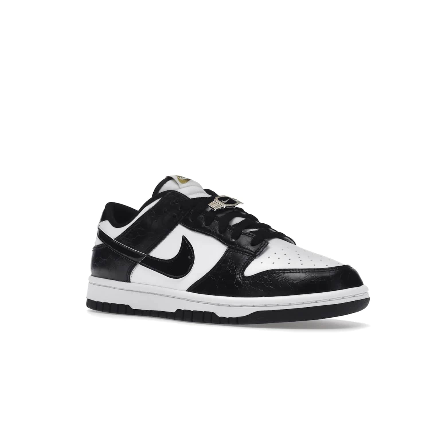 Nike Dunk Low SE World Champs Black White - Image 5 - Only at www.BallersClubKickz.com - Step up your look with the Nike Dunk Low SE World Champs Black White. Leather base, lace eyelets, Swoosh design, gold-stitched brand, and black and gold lace dubraes. Get it in May 2022 for $120.