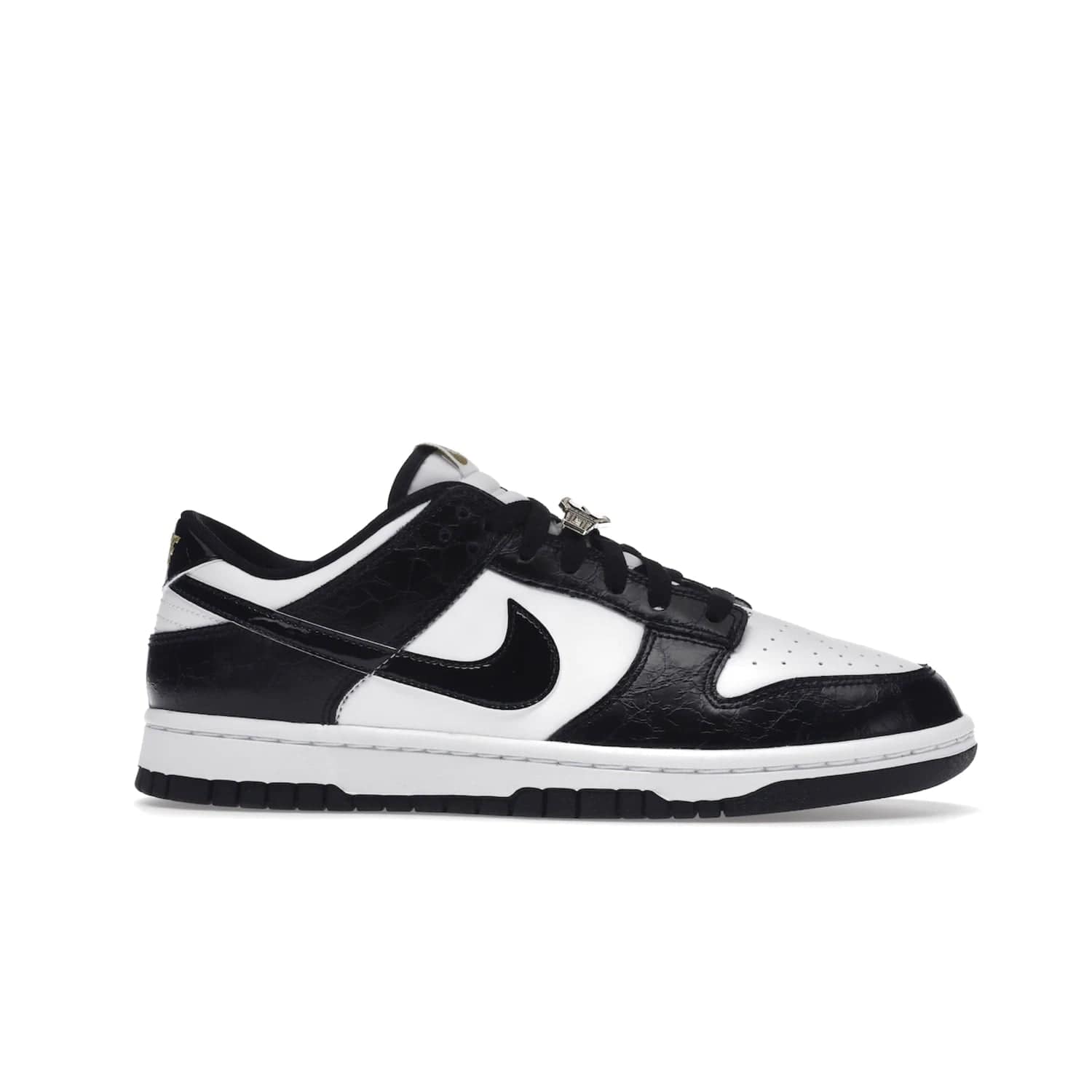 Nike Dunk Low SE World Champs Black White - Image 2 - Only at www.BallersClubKickz.com - Step up your look with the Nike Dunk Low SE World Champs Black White. Leather base, lace eyelets, Swoosh design, gold-stitched brand, and black and gold lace dubraes. Get it in May 2022 for $120.