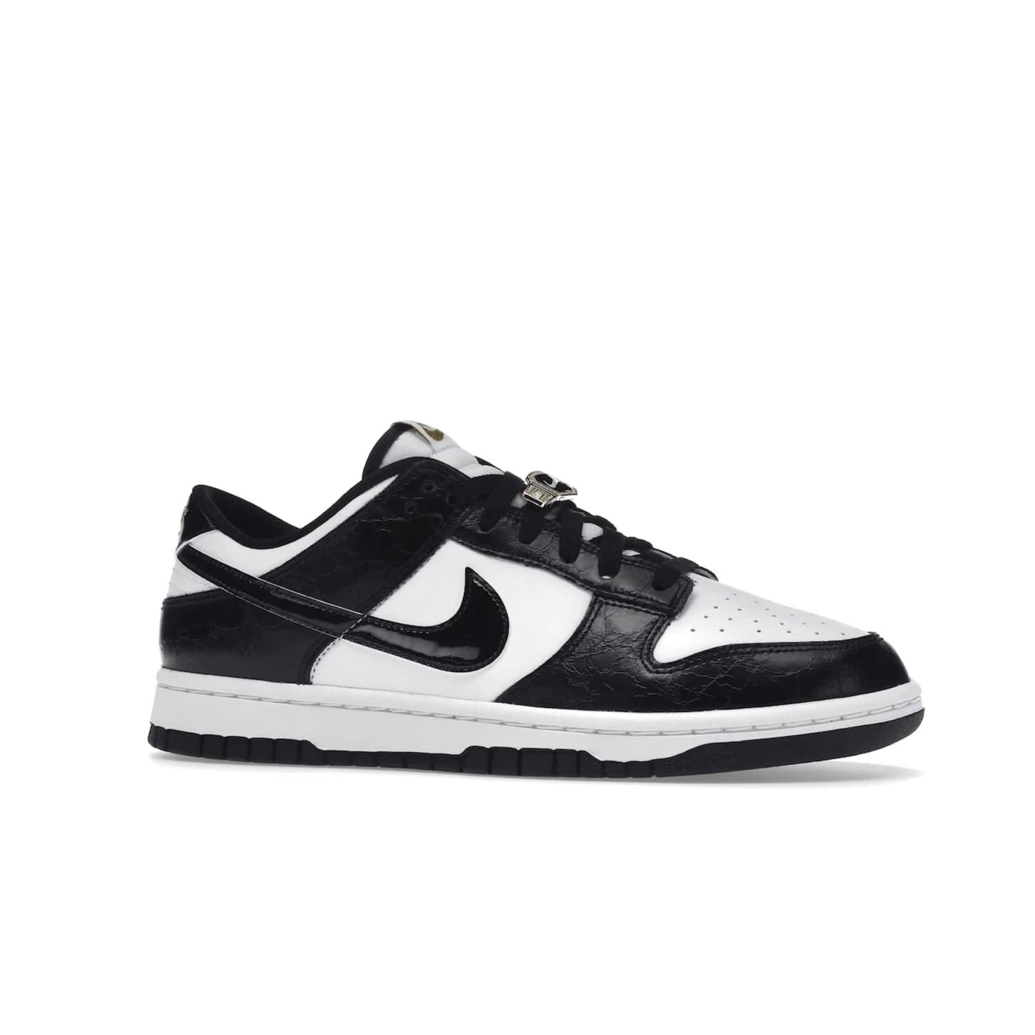 Nike Dunk Low SE World Champs Black White - Image 3 - Only at www.BallersClubKickz.com - Step up your look with the Nike Dunk Low SE World Champs Black White. Leather base, lace eyelets, Swoosh design, gold-stitched brand, and black and gold lace dubraes. Get it in May 2022 for $120.