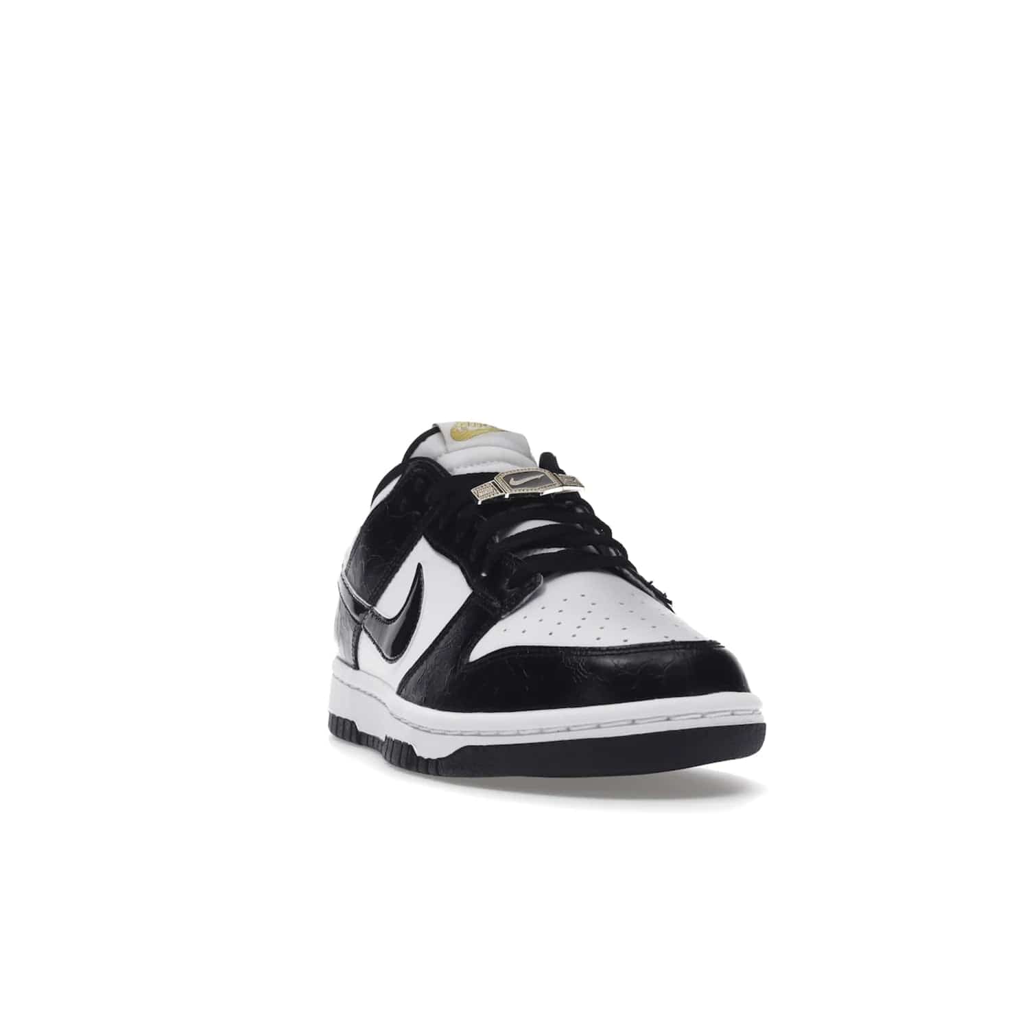 Nike Dunk Low SE World Champs Black White - Image 8 - Only at www.BallersClubKickz.com - Step up your look with the Nike Dunk Low SE World Champs Black White. Leather base, lace eyelets, Swoosh design, gold-stitched brand, and black and gold lace dubraes. Get it in May 2022 for $120.