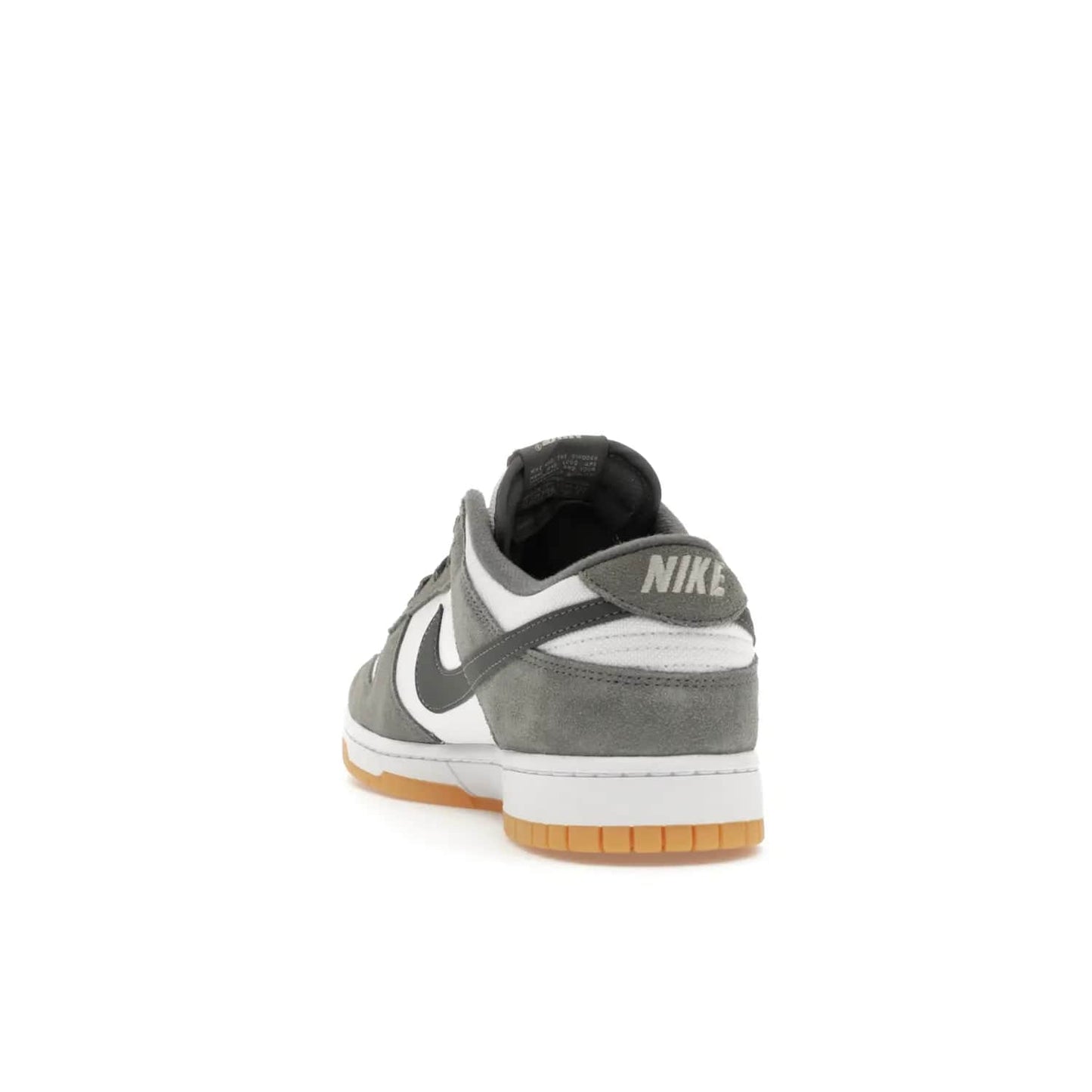 Nike Dunk Low Smoke Grey Gum 3M Swoosh - Image 26 - Only at www.BallersClubKickz.com - Introducing the Nike Dunk Low "Smoke Grey Gum 3M Swoosh". A stylish low-top sneaker with a white canvas-textile base and gum light brown outsole. Get the modern update with the bold "Smoke Grey" 3M swoosh. Available on October 3, 2023 at select Nike retailers.