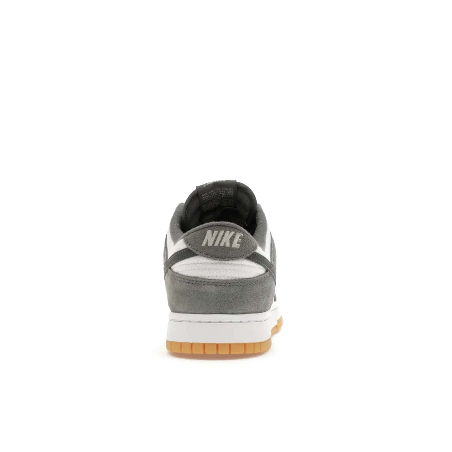 Nike Dunk Low Smoke Grey Gum 3M Swoosh - Image 28 - Only at www.BallersClubKickz.com - Introducing the Nike Dunk Low "Smoke Grey Gum 3M Swoosh". A stylish low-top sneaker with a white canvas-textile base and gum light brown outsole. Get the modern update with the bold "Smoke Grey" 3M swoosh. Available on October 3, 2023 at select Nike retailers.