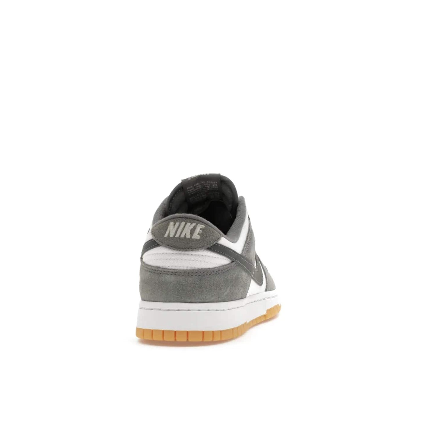 Nike Dunk Low Smoke Grey Gum 3M Swoosh - Image 29 - Only at www.BallersClubKickz.com - Introducing the Nike Dunk Low "Smoke Grey Gum 3M Swoosh". A stylish low-top sneaker with a white canvas-textile base and gum light brown outsole. Get the modern update with the bold "Smoke Grey" 3M swoosh. Available on October 3, 2023 at select Nike retailers.