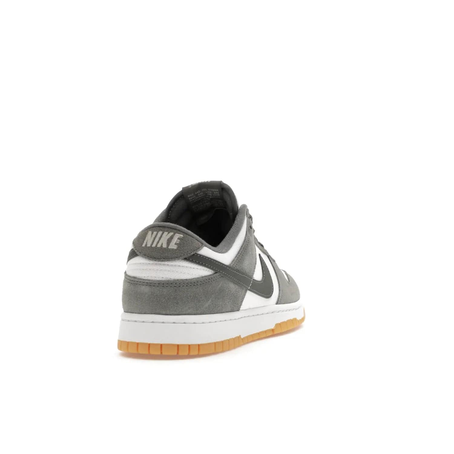 Nike Dunk Low Smoke Grey Gum 3M Swoosh - Image 30 - Only at www.BallersClubKickz.com - Introducing the Nike Dunk Low "Smoke Grey Gum 3M Swoosh". A stylish low-top sneaker with a white canvas-textile base and gum light brown outsole. Get the modern update with the bold "Smoke Grey" 3M swoosh. Available on October 3, 2023 at select Nike retailers.