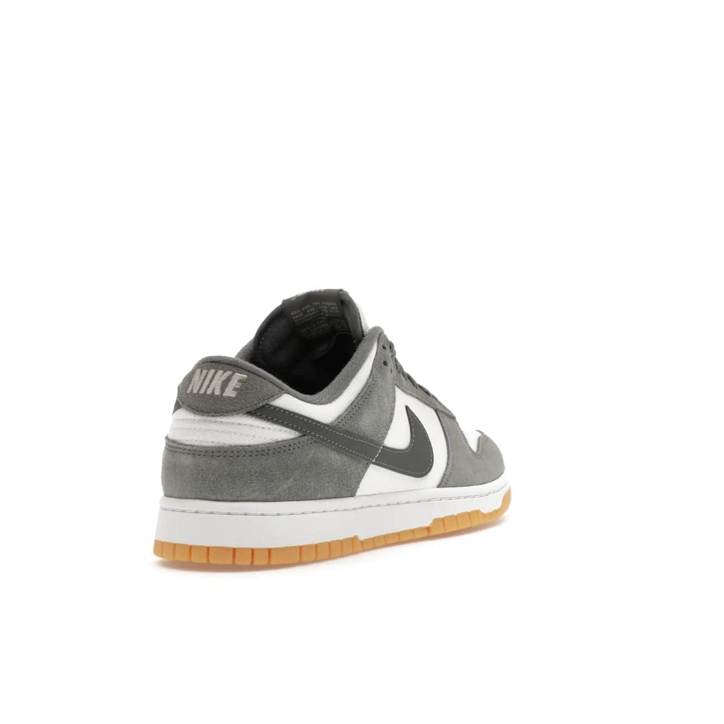 Nike Dunk Low Smoke Grey Gum 3M Swoosh - Image 31 - Only at www.BallersClubKickz.com - Introducing the Nike Dunk Low "Smoke Grey Gum 3M Swoosh". A stylish low-top sneaker with a white canvas-textile base and gum light brown outsole. Get the modern update with the bold "Smoke Grey" 3M swoosh. Available on October 3, 2023 at select Nike retailers.