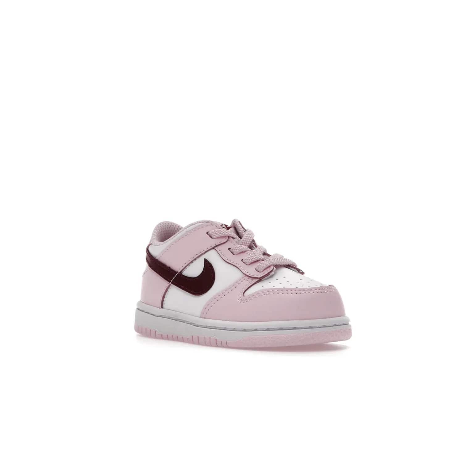 Nike Dunk Low Pink Red White (TD) - Image 6 - Only at www.BallersClubKickz.com - Classic Nike Dunk Low with bright pink and red color blocking. A great addition to any collection. Must-have.