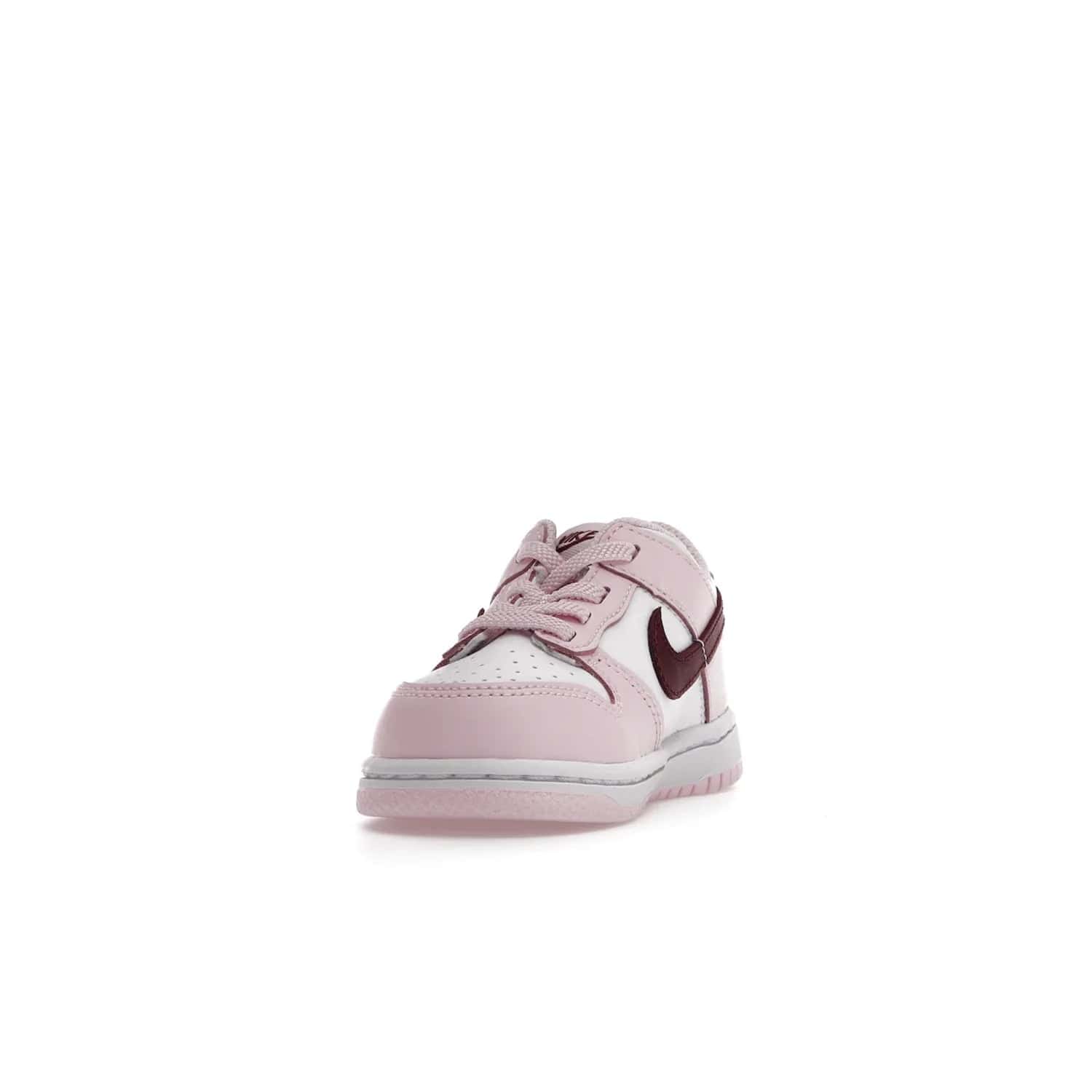 Nike Dunk Low Pink Red White (TD) - Image 12 - Only at www.BallersClubKickz.com - Classic Nike Dunk Low with bright pink and red color blocking. A great addition to any collection. Must-have.