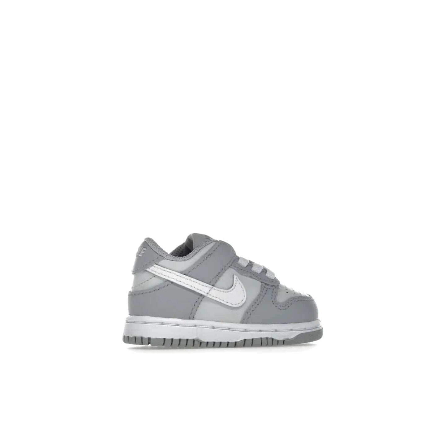 Nike Dunk Low Two-Toned Grey (TD) - Image 35 - Only at www.BallersClubKickz.com - Clean and sharp Nike Dunk Low Two-Toned Grey (TD) release on March 1, 2022. Pure Platinum and White-Wolf Grey design with extra-cushioned midsole for optimal comfort and style.